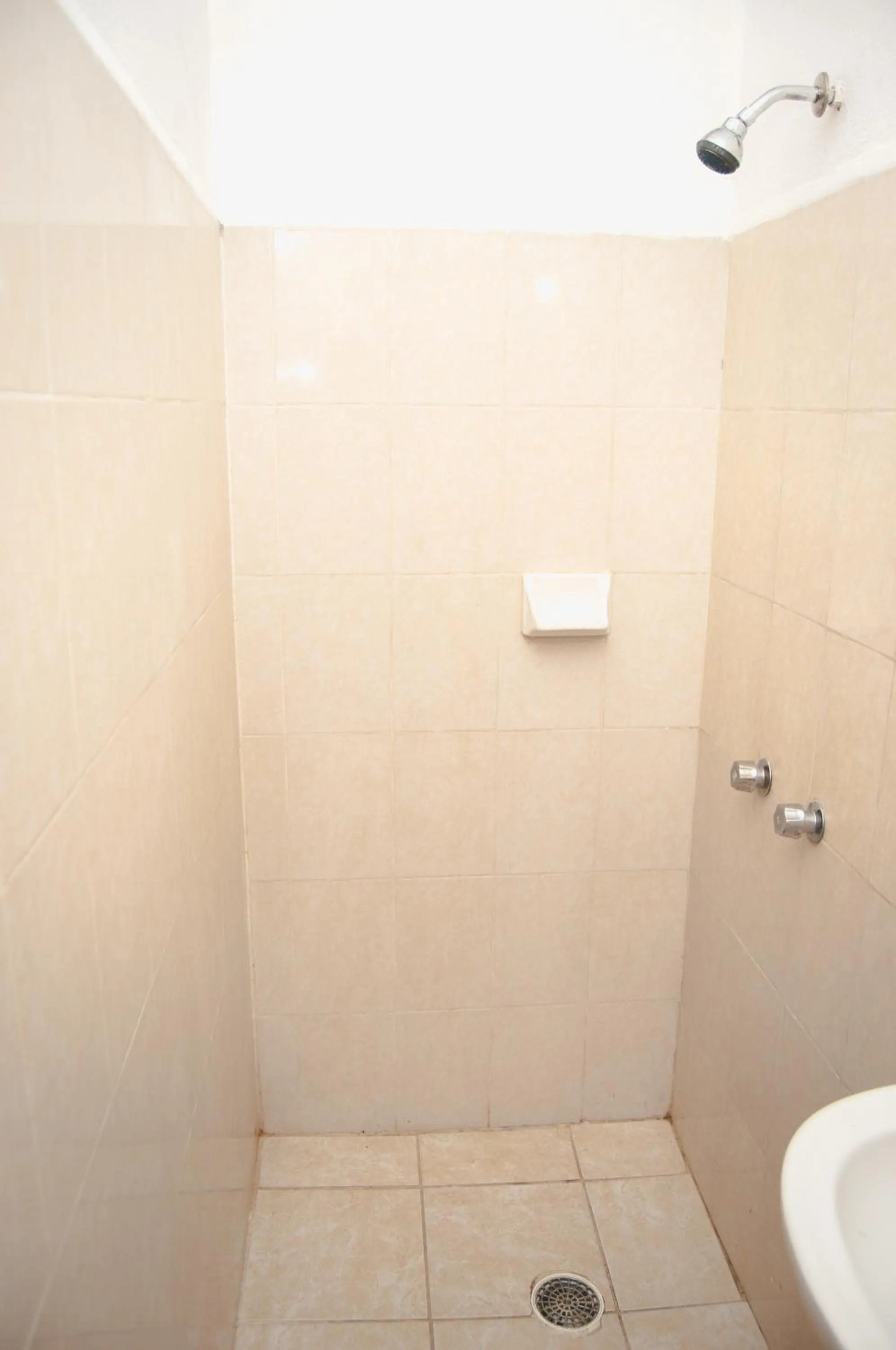 Shower in Hotel y Restaurante EL TEXANO