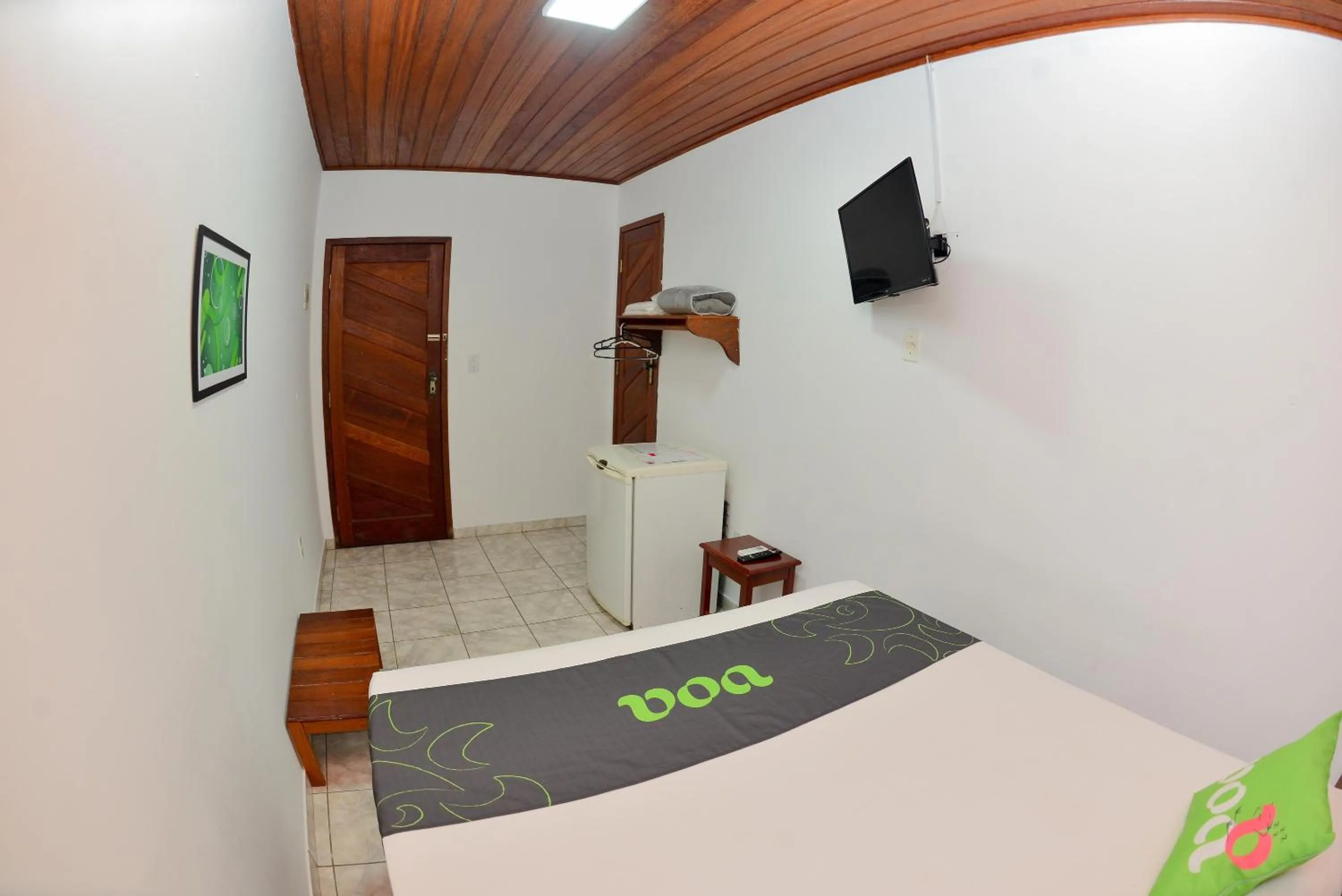 Bed in VOA Pousada Dos Jasmins