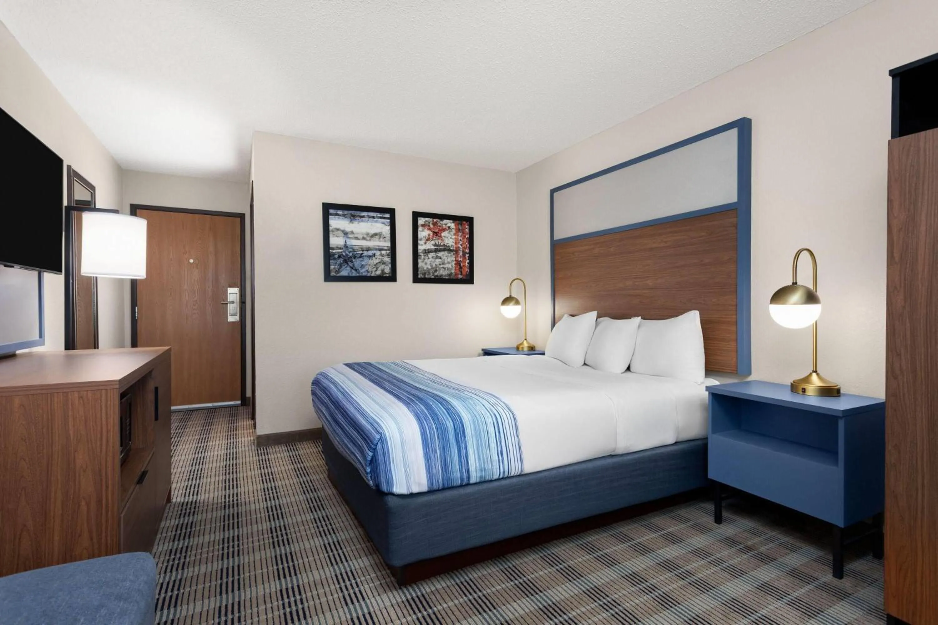 Photo of the whole room, Bed in AmericInn by Wyndham Roseau