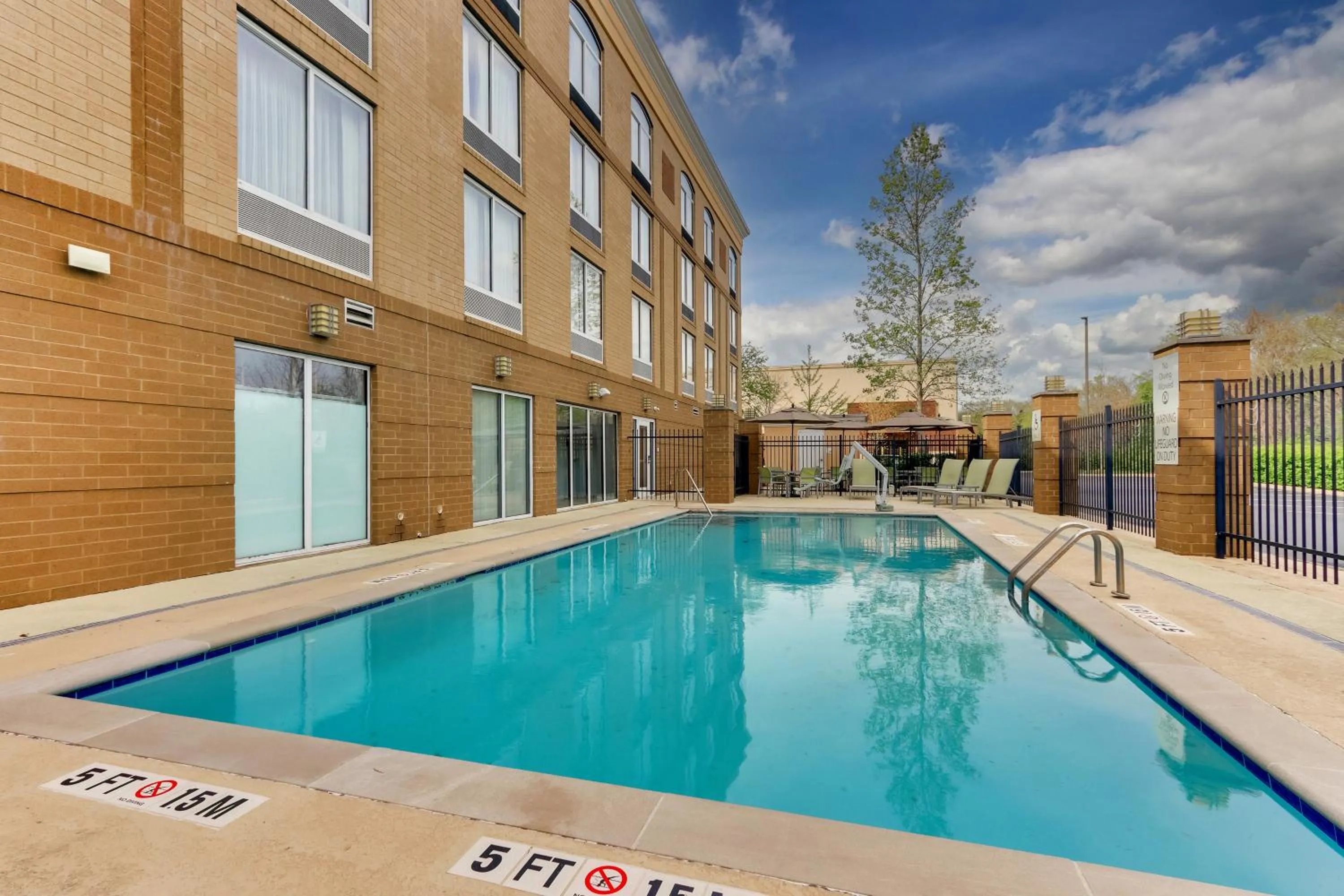 Swimming pool in Holiday Inn Franklin - Cool Springs by IHG