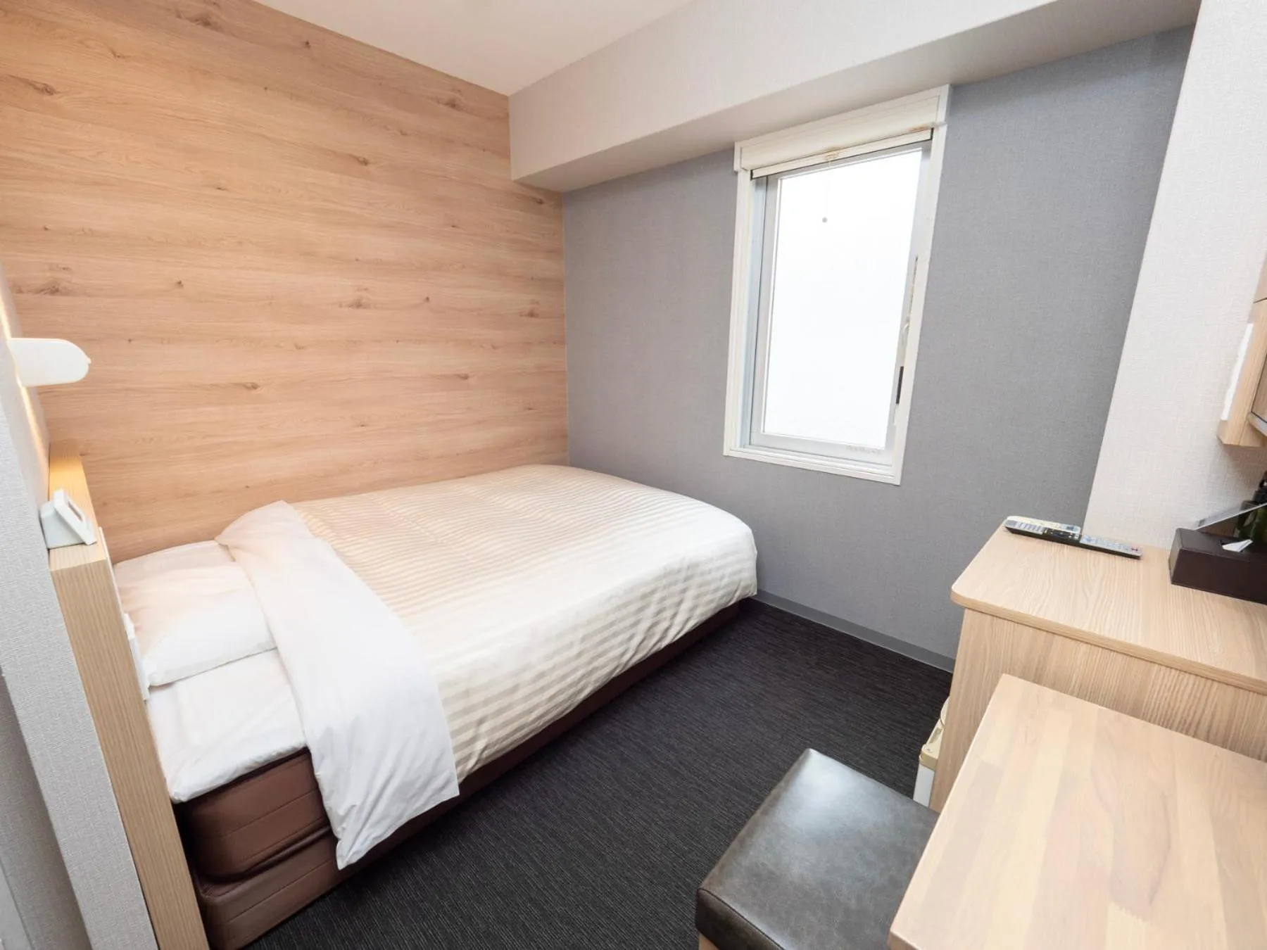 Bed in Super Hotel Osaka Natural Hot Springs