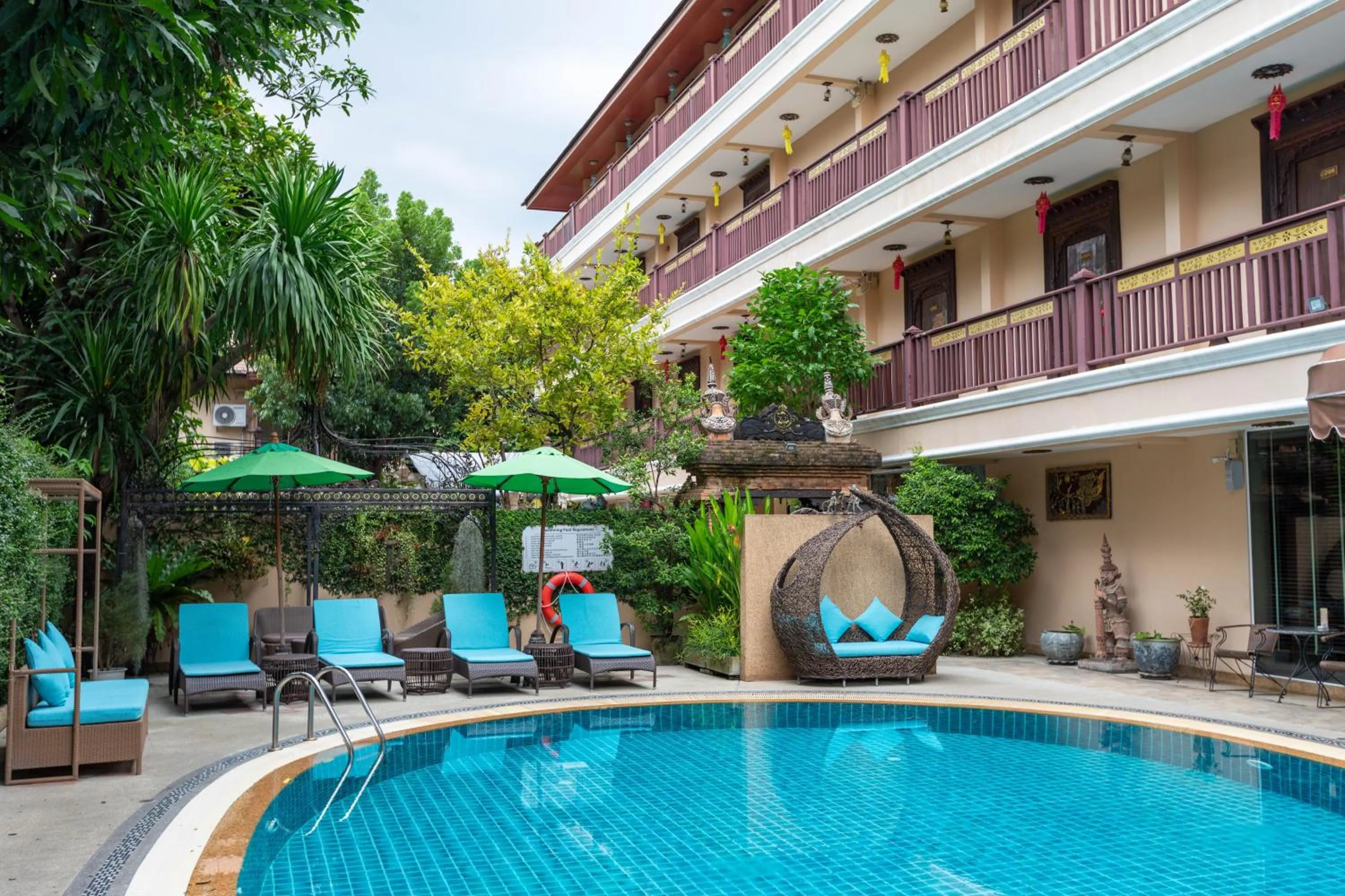 Swimming pool in At Chiang Mai Hotel