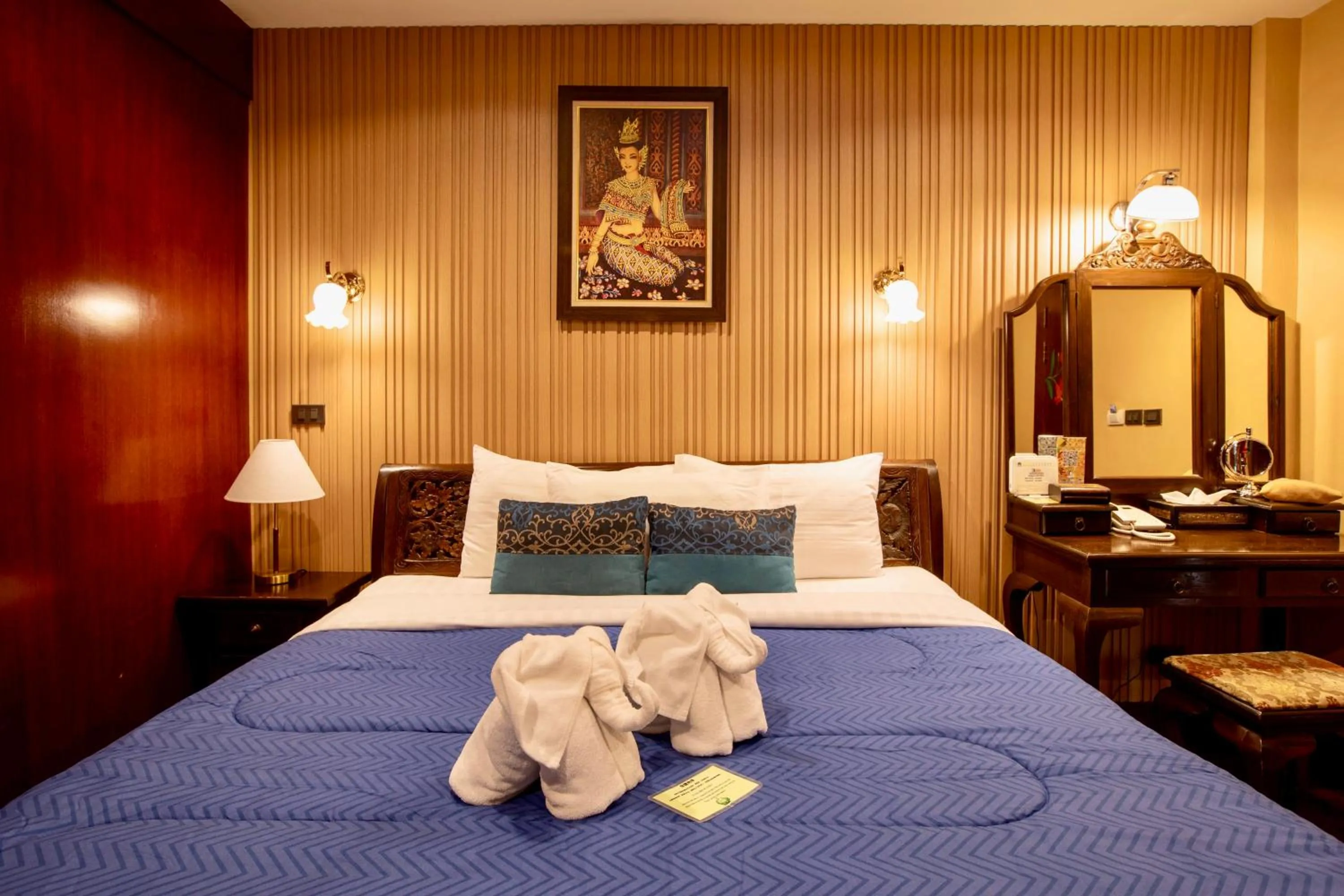 Bed in At Chiang Mai Hotel