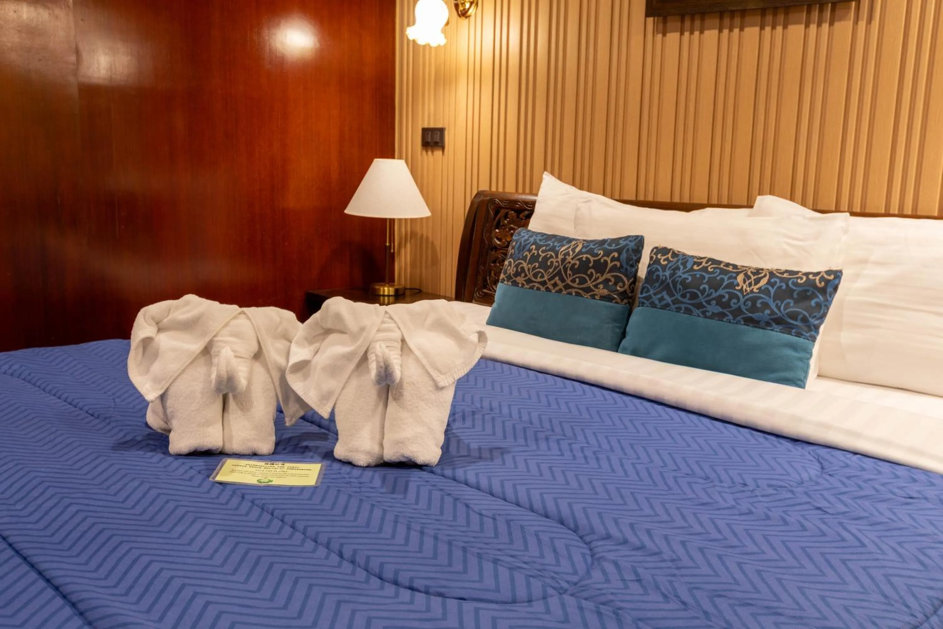 Bed in At Chiang Mai Hotel