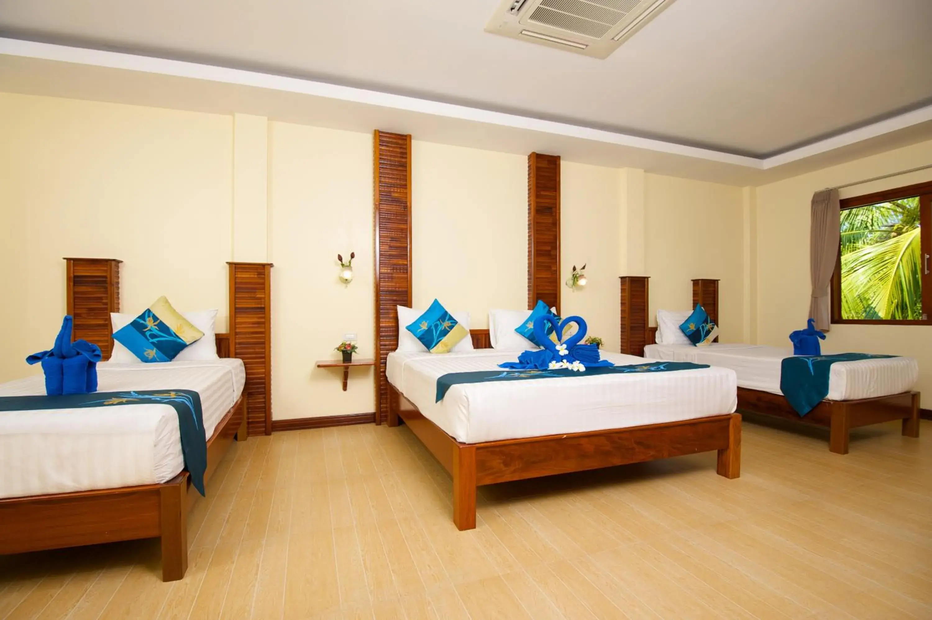 Photo of the whole room, Bed in Wind Beach Resort Photo of the whole room, Bed in Wind Beach Resort