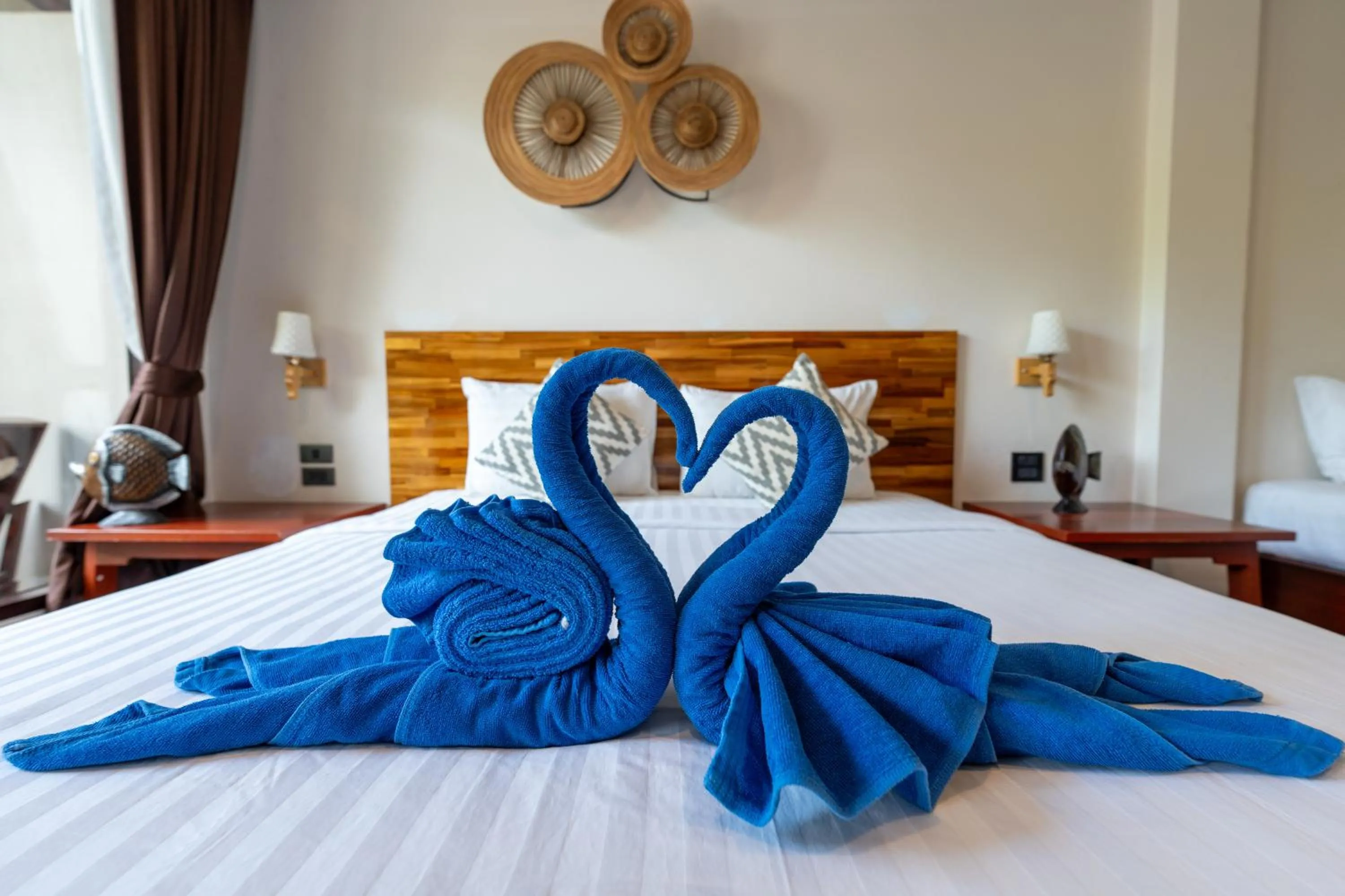 towels, Bed in Wind Beach Resort