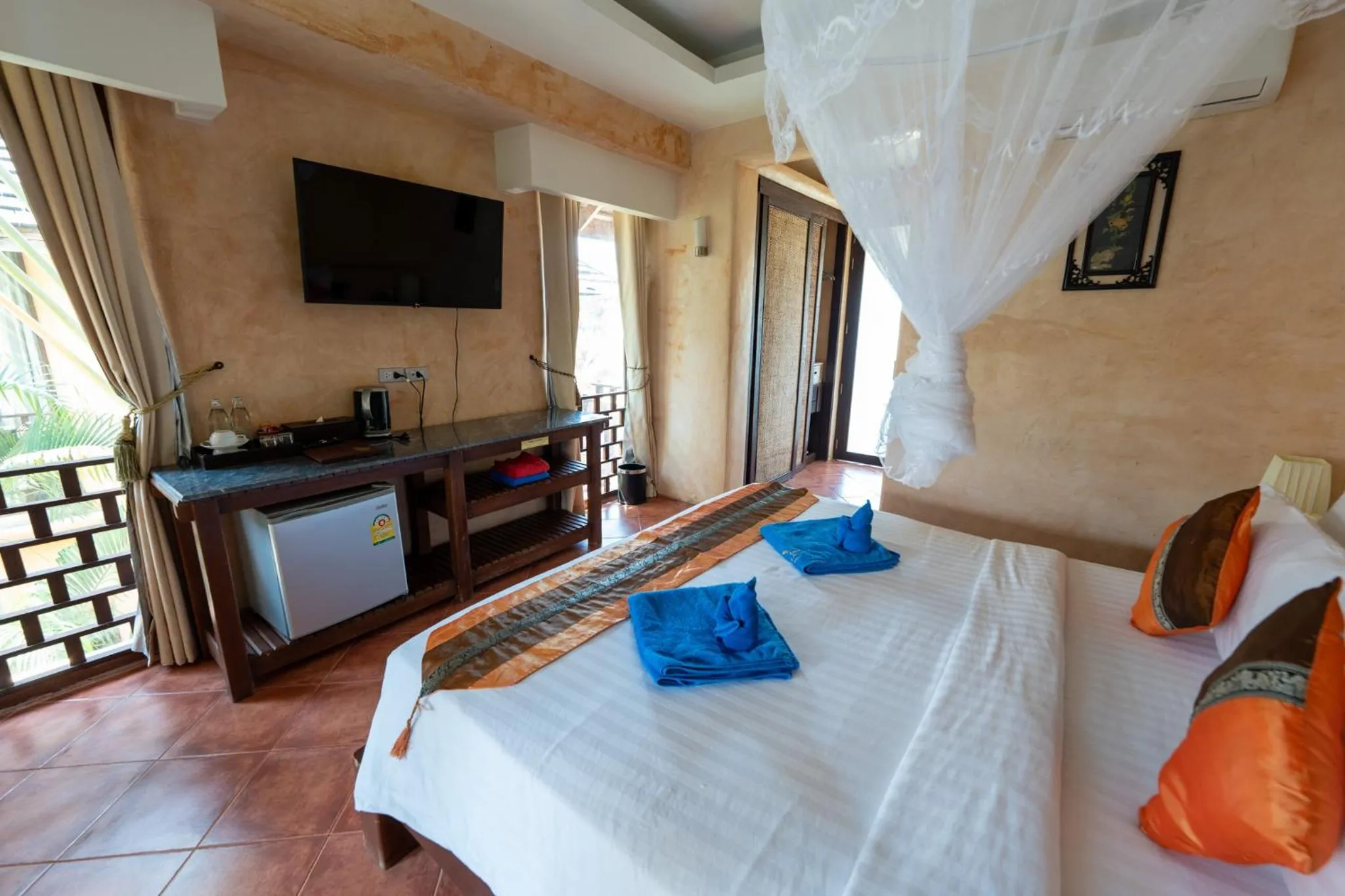 Photo of the whole room, Bed in Wind Beach Resort