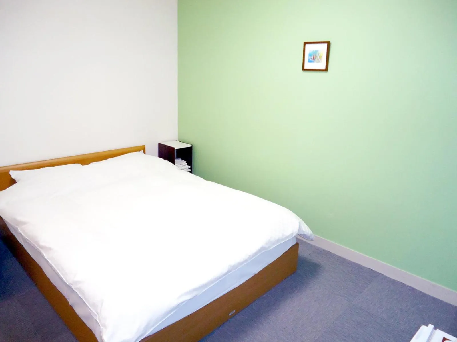 Bed in Shin-Okubo City Hotel