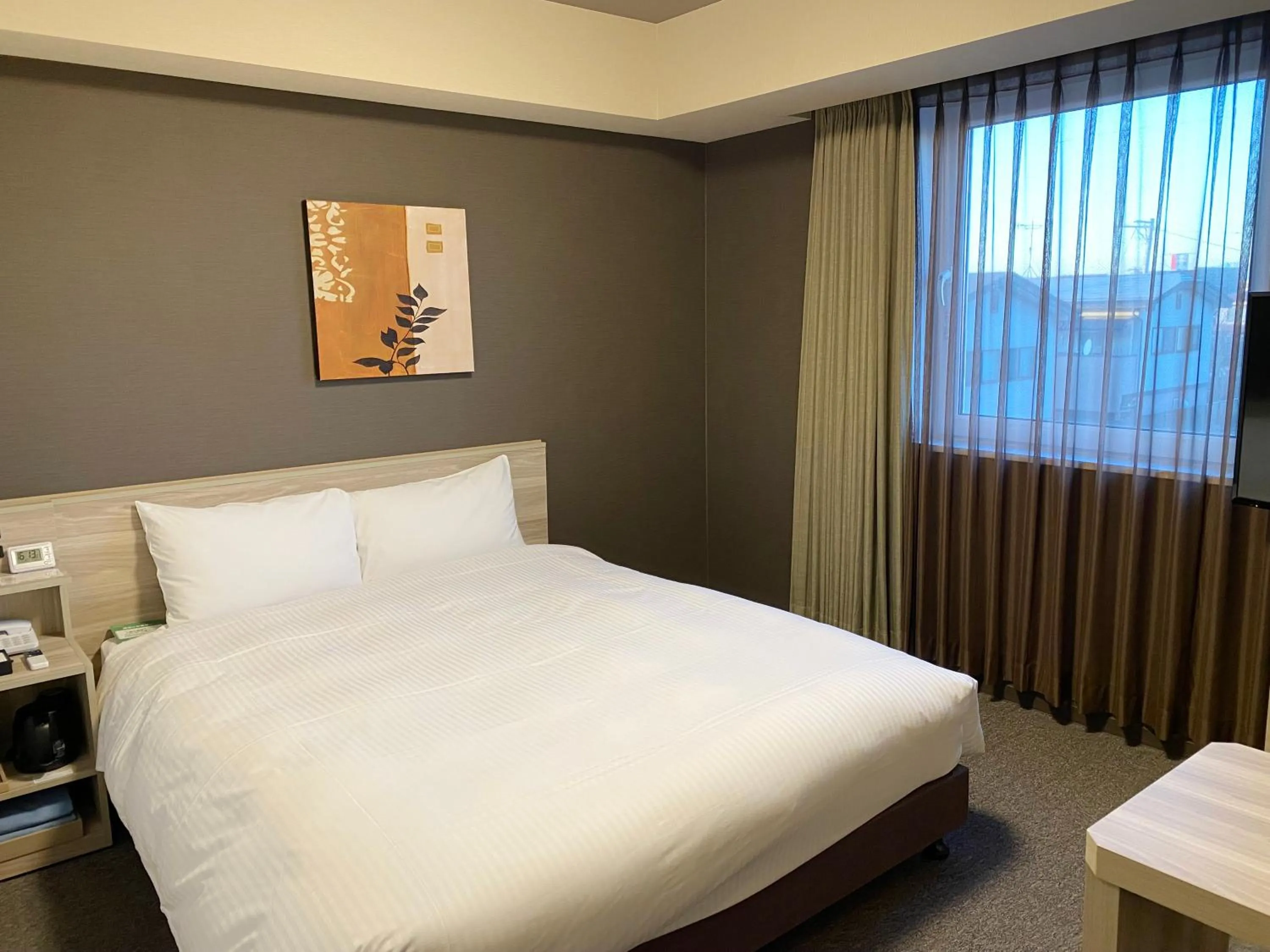 Photo of the whole room, Bed in Hotel Route-Inn Yamagata Minami -Daigaku Byoin Mae-