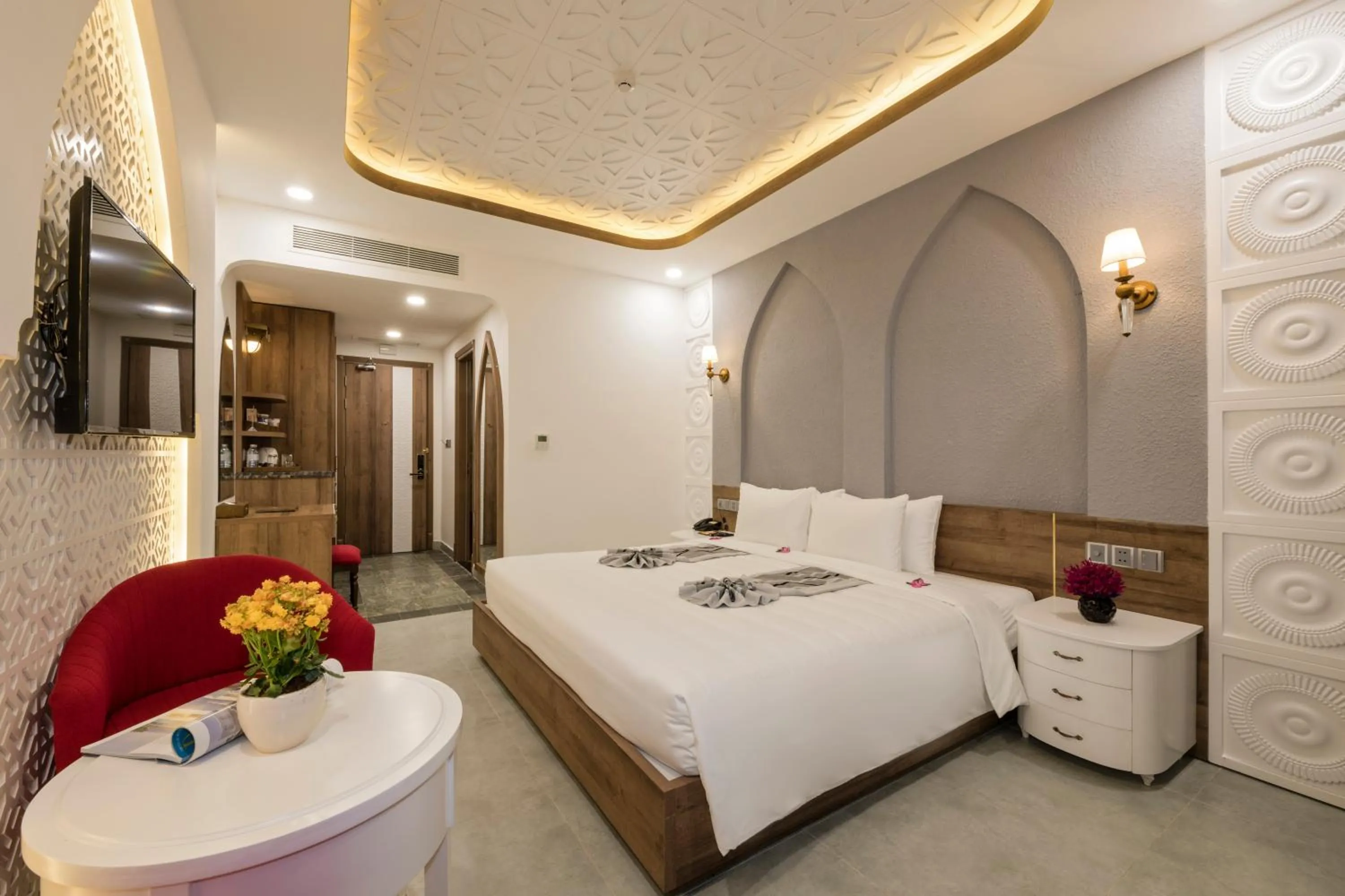 Communal lounge/ TV room, Bed in My Son Heritage Resort and Spa