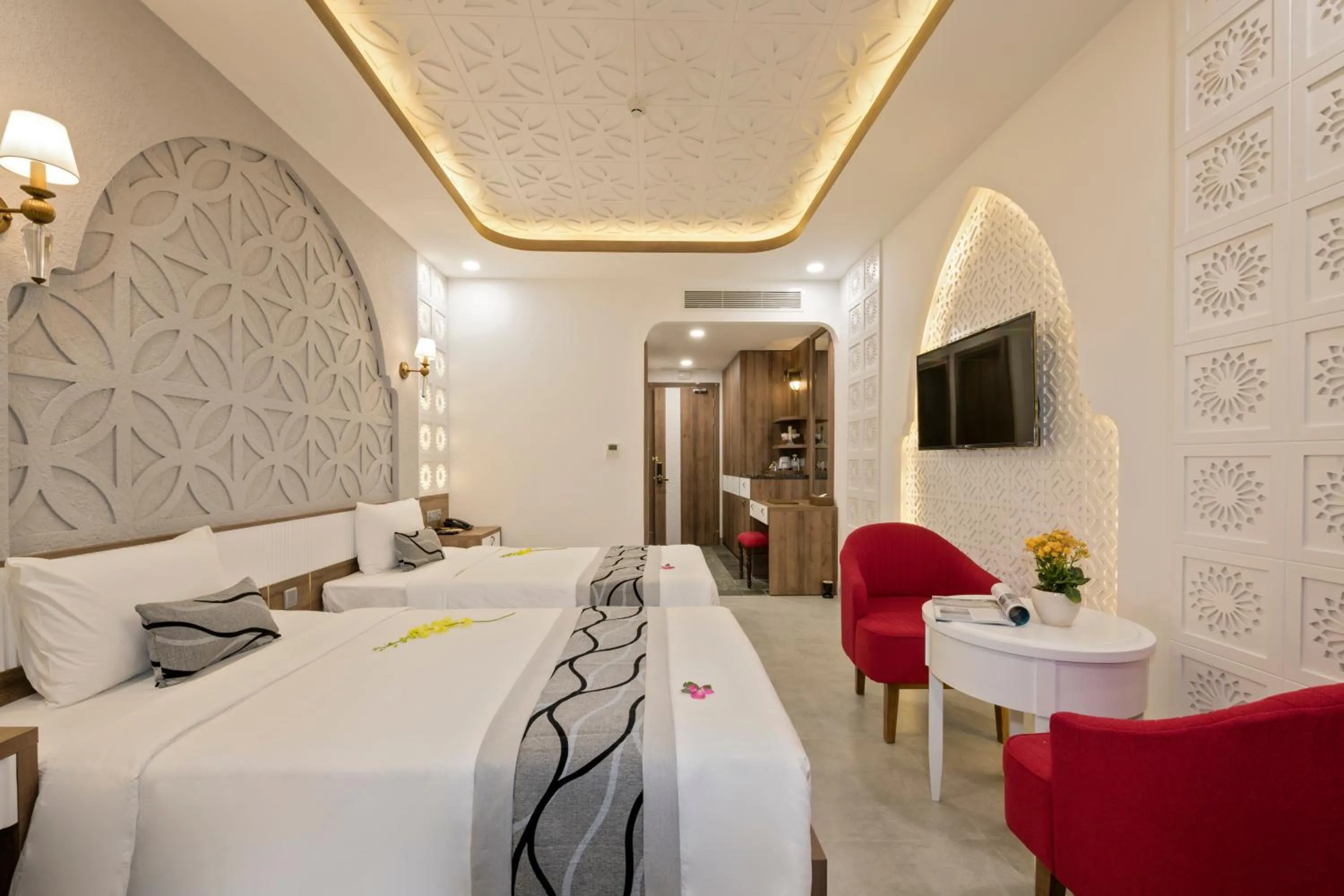 Communal lounge/ TV room, Bed in My Son Heritage Resort and Spa