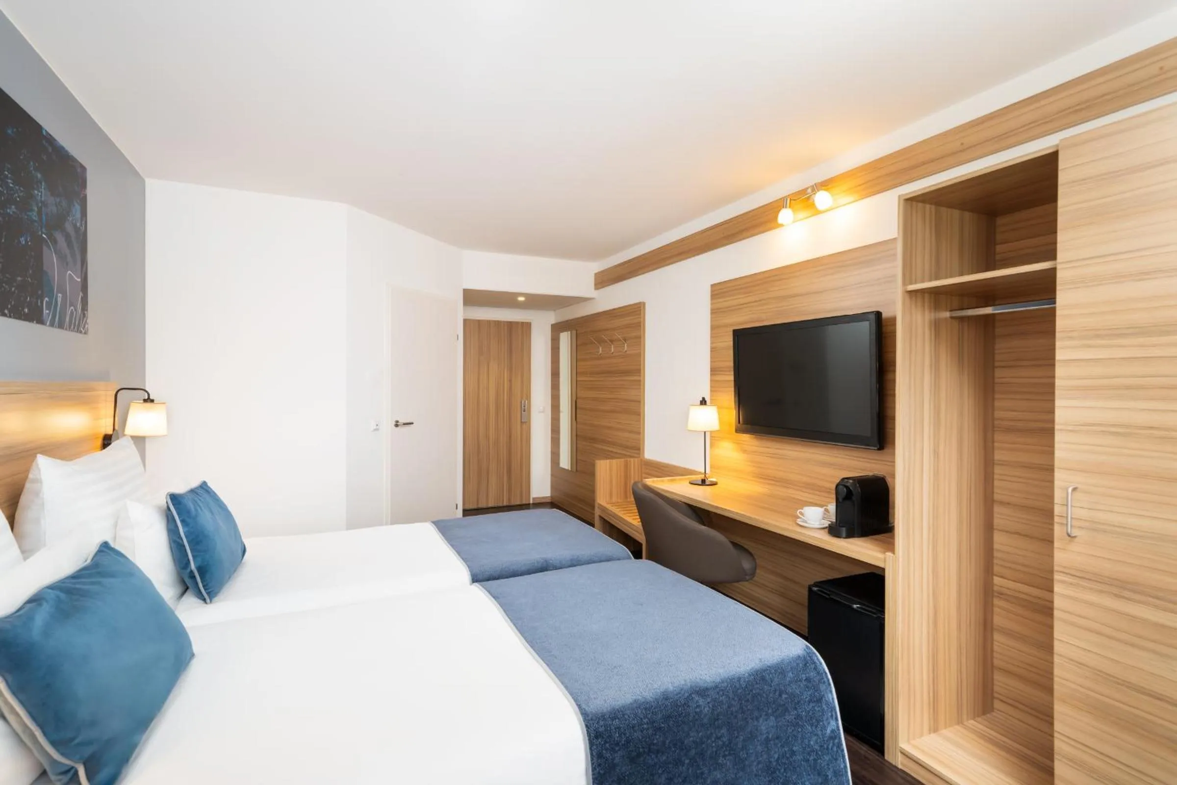 Bed in Leonardo Hotel Vienna Schönbrunn