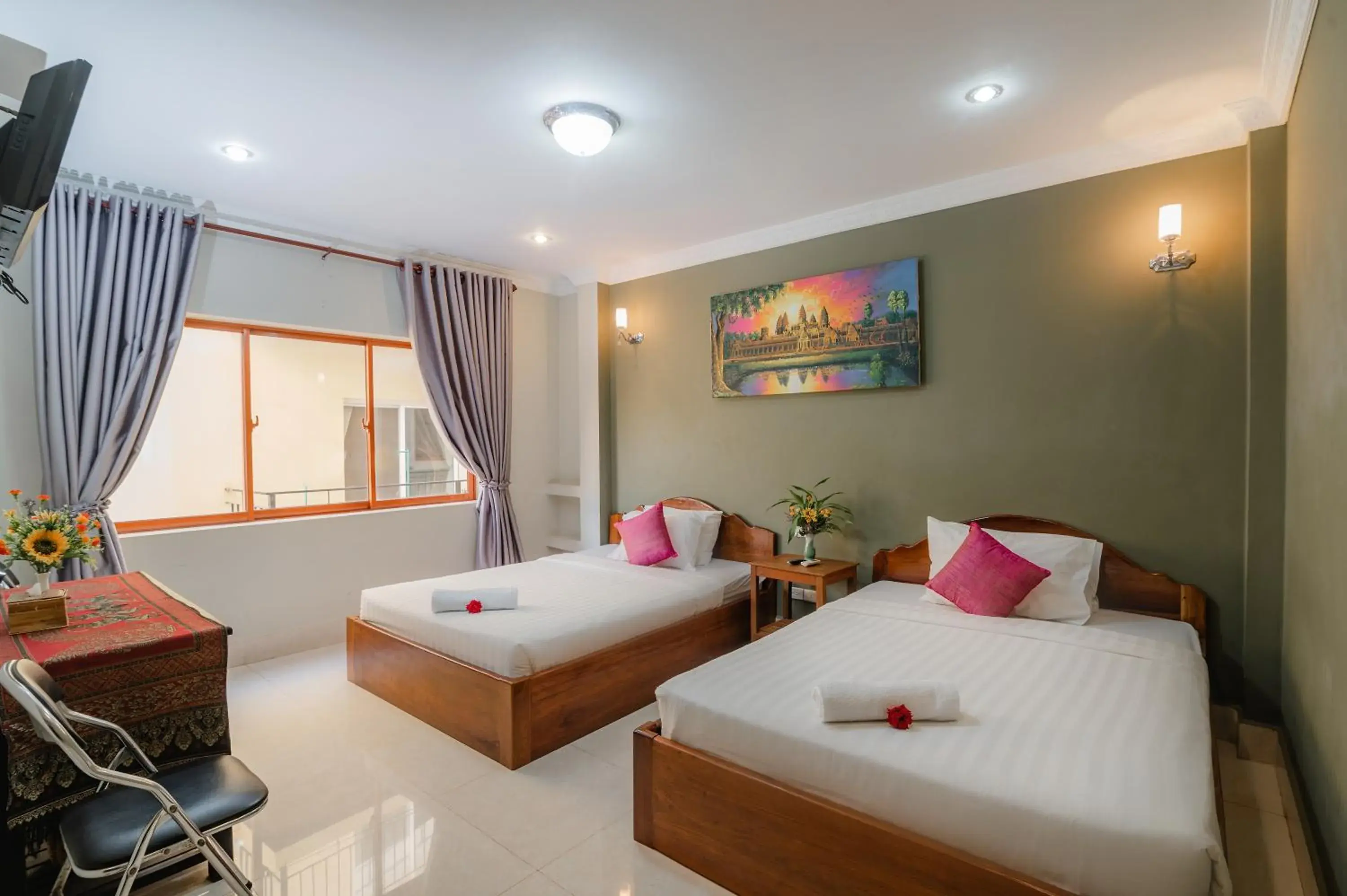 Bed in Sinaka Angkor Hotel Bed in Sinaka Angkor Hotel