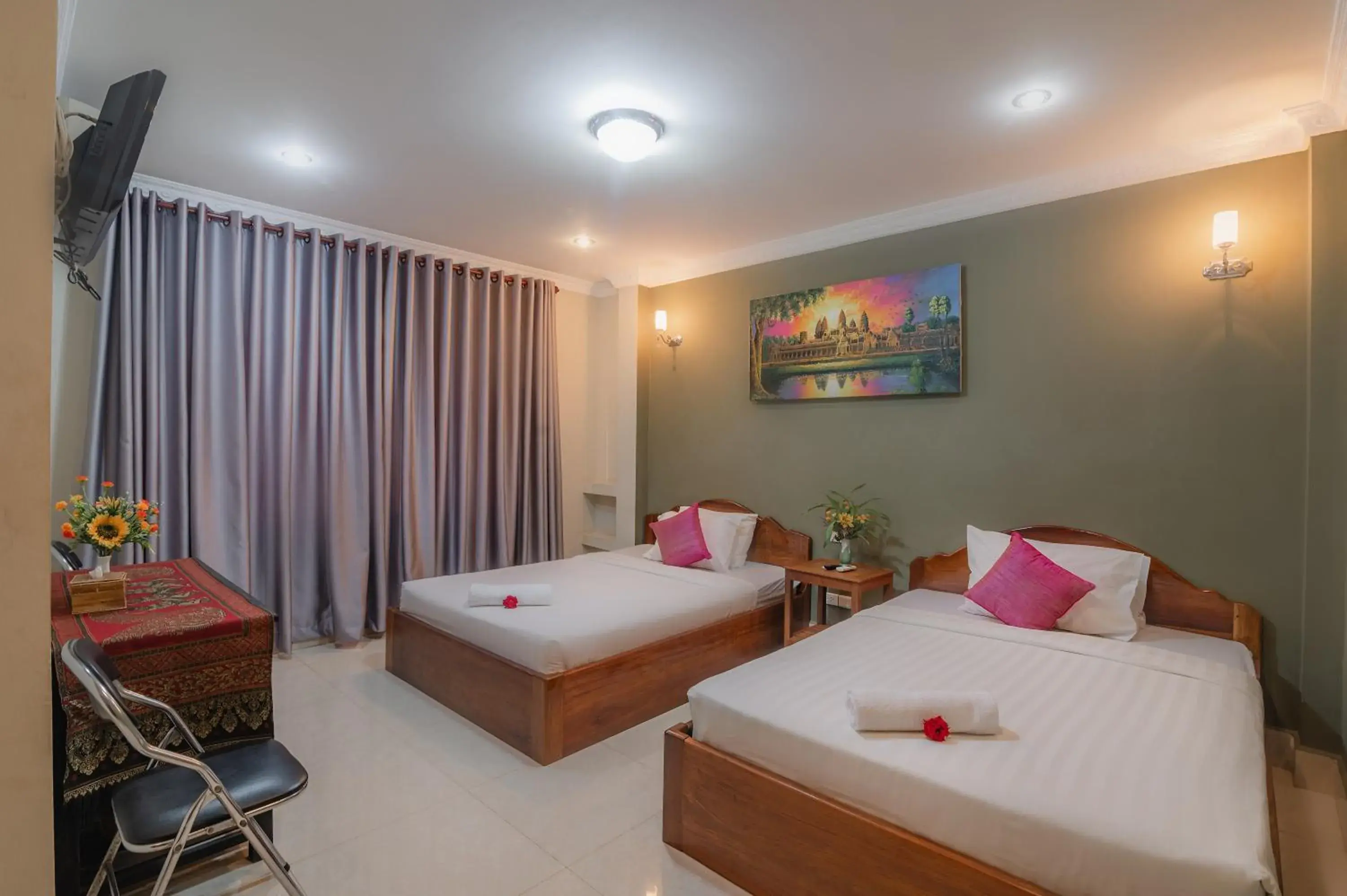 Bed in Sinaka Angkor Hotel Bed in Sinaka Angkor Hotel