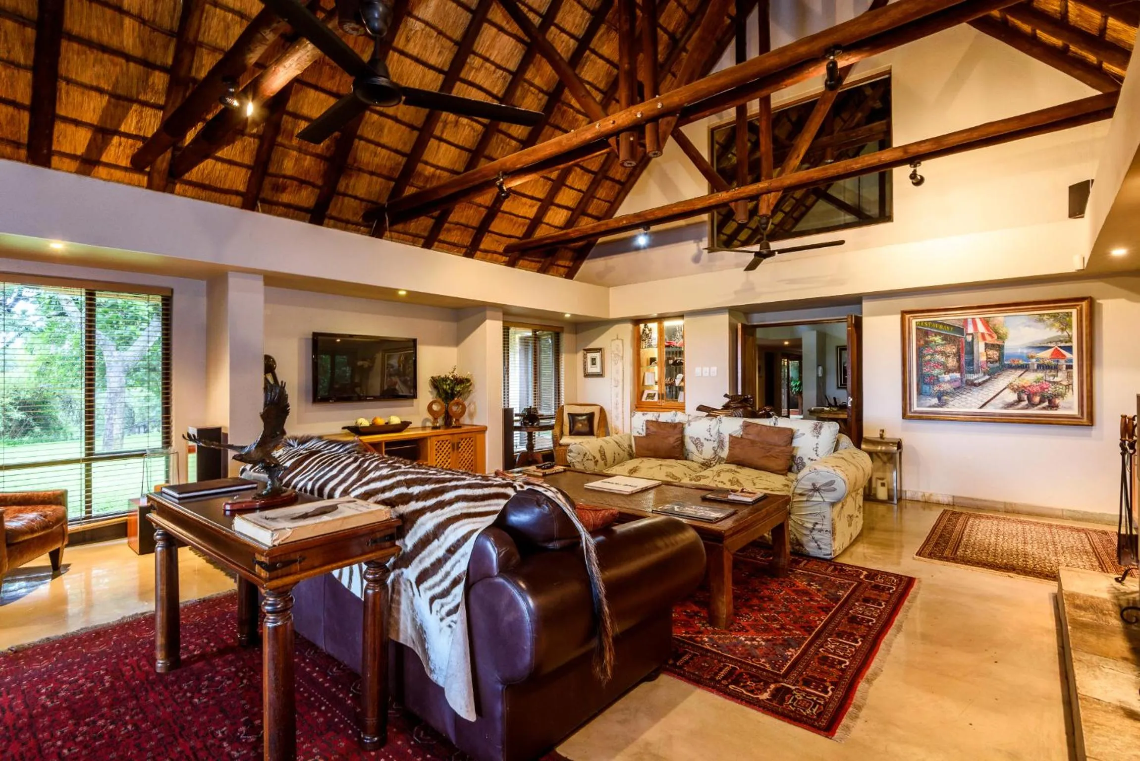 Communal lounge/ TV room in Khaya Ndlovu Safari Manor