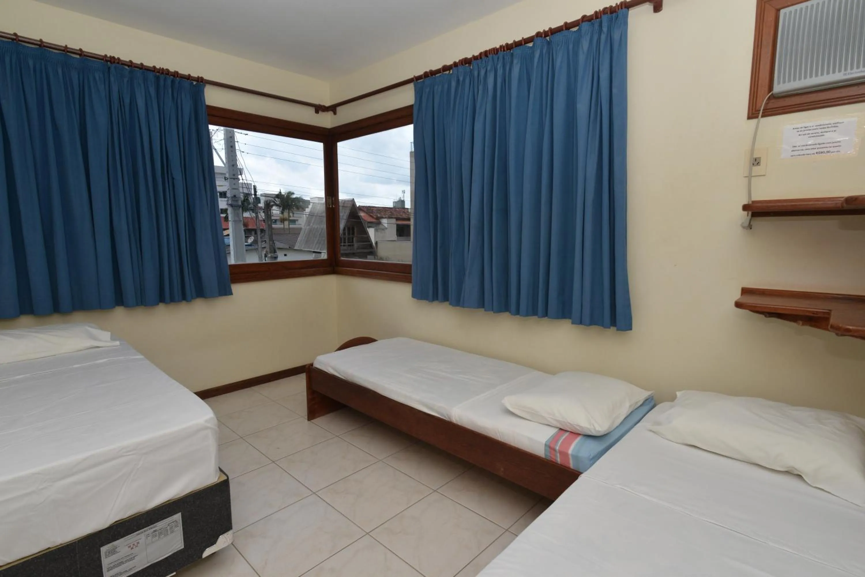 Bed in Oceano Pousada - Buffet de café da manhã e serviço de quarto diário