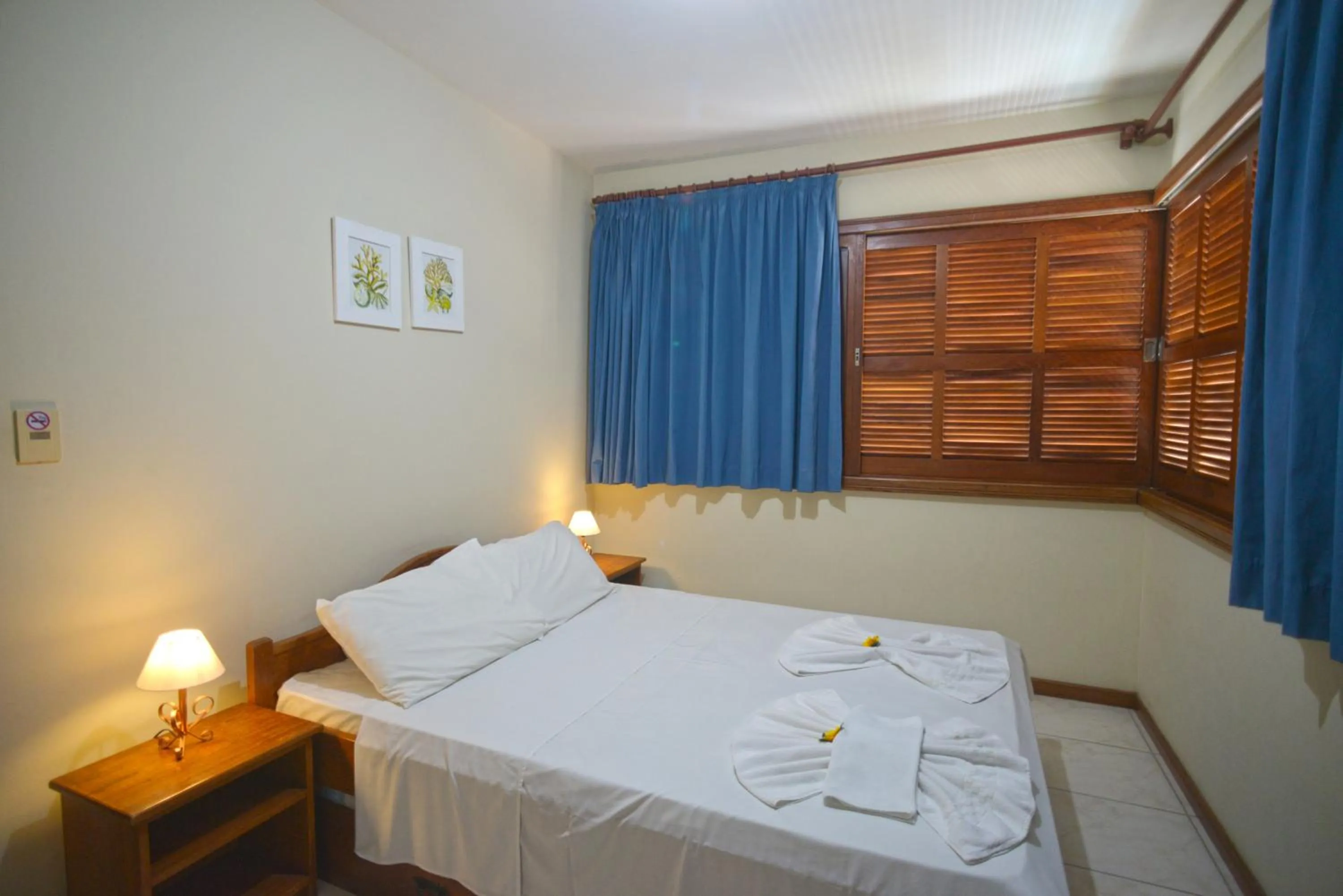 Bed in Oceano Pousada - Buffet de café da manhã e serviço de quarto diário