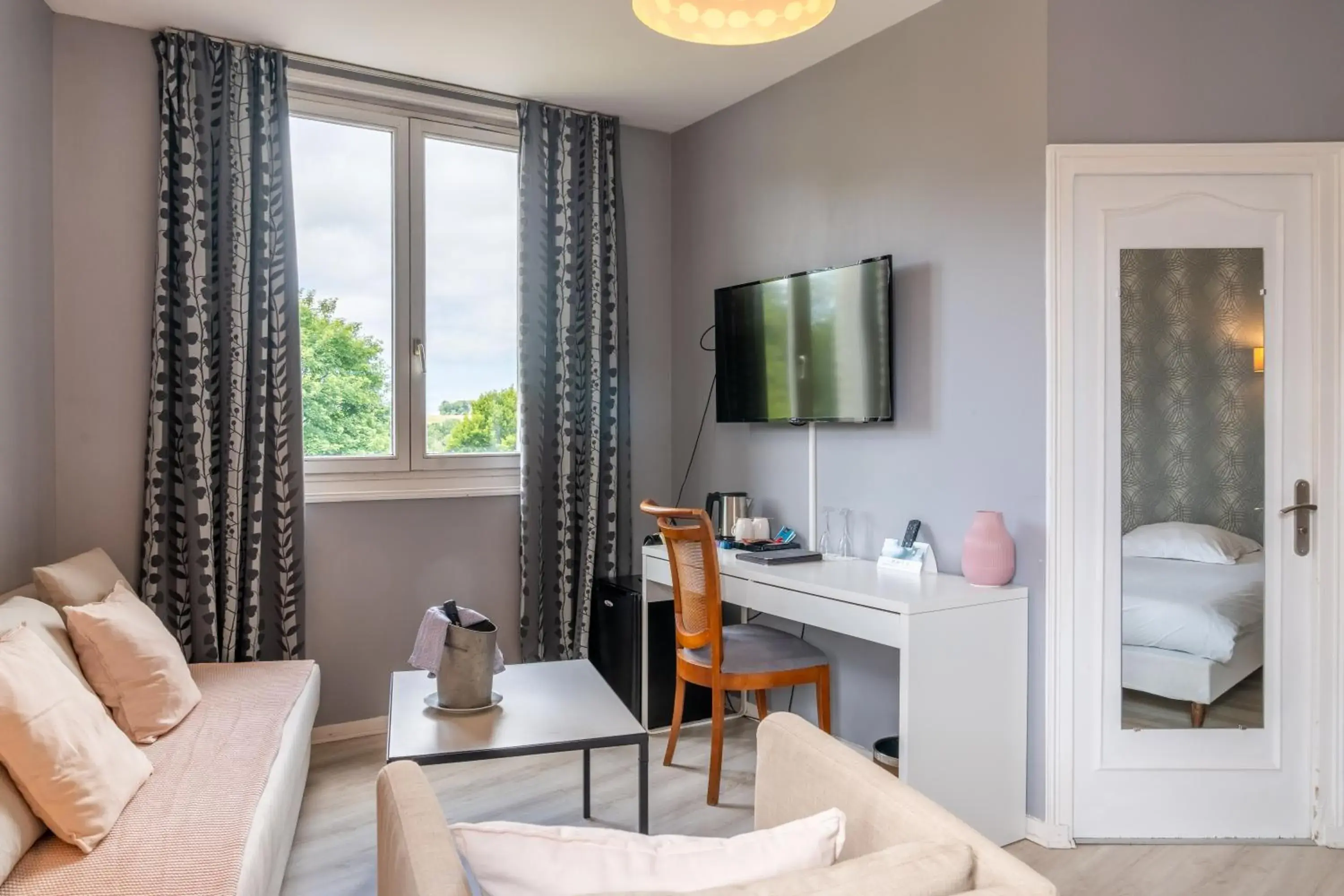 Seating area, Bed in Logis Auberge Saint Thégonnec & son Restaurant Seating area, Bed in Logis Auberge Saint Thégonnec & son Restaurant