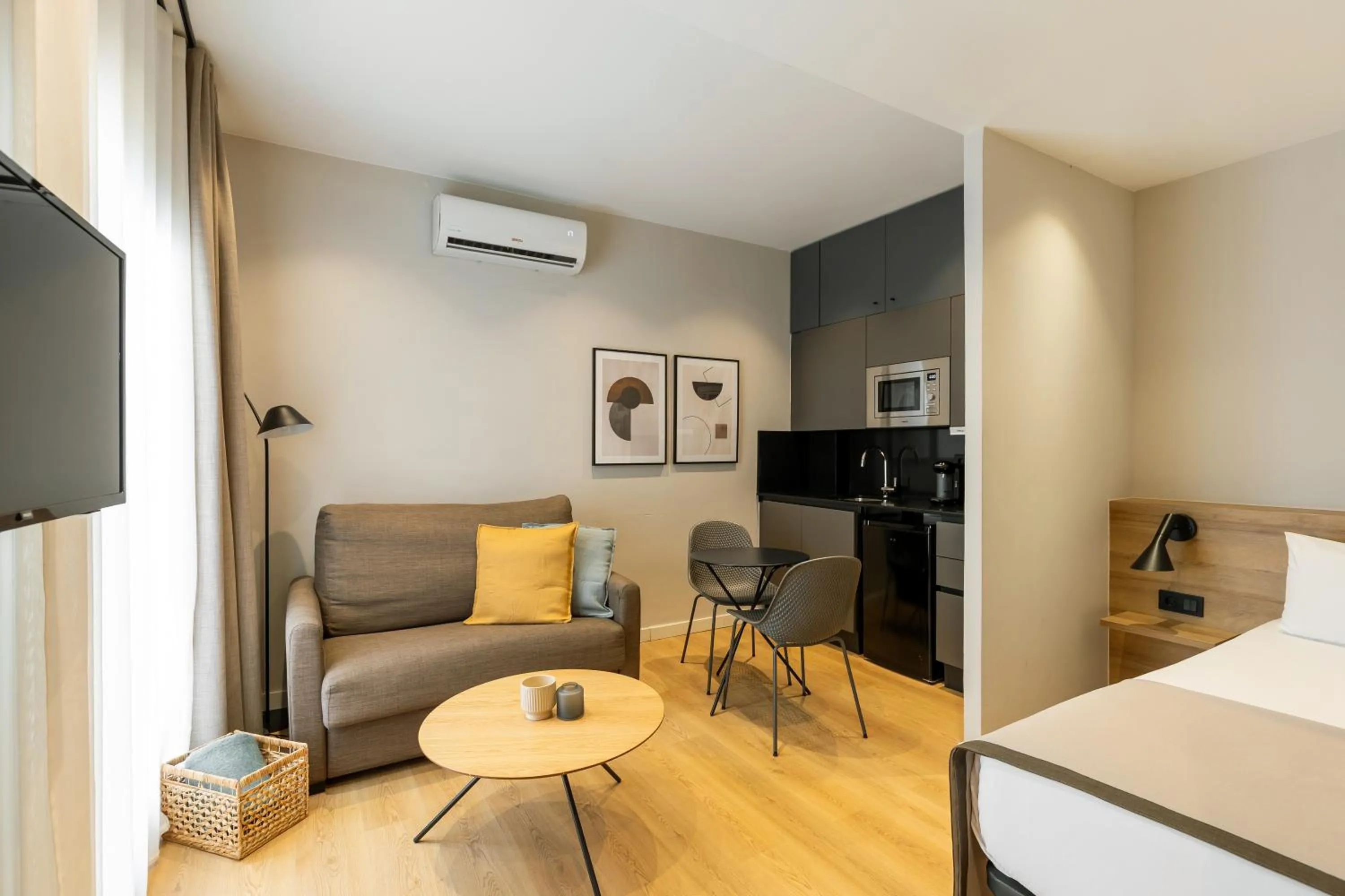 Living room, Bed in Apartamentos Laforja