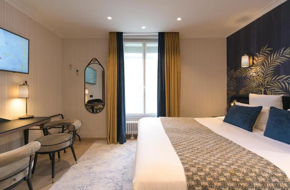 Bed in Hôtel Tourisme Avenue