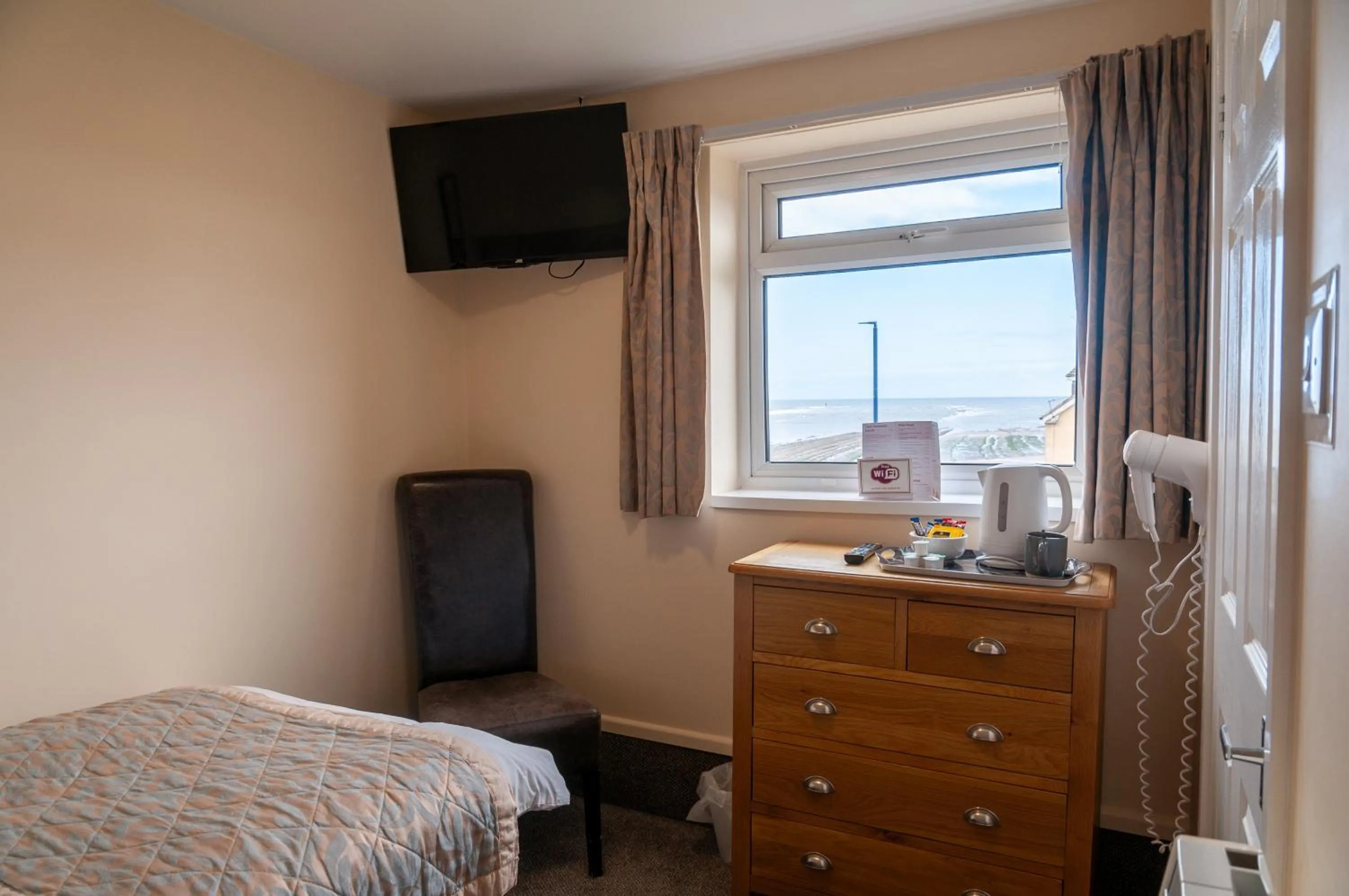 Bed in Claxton Hotel