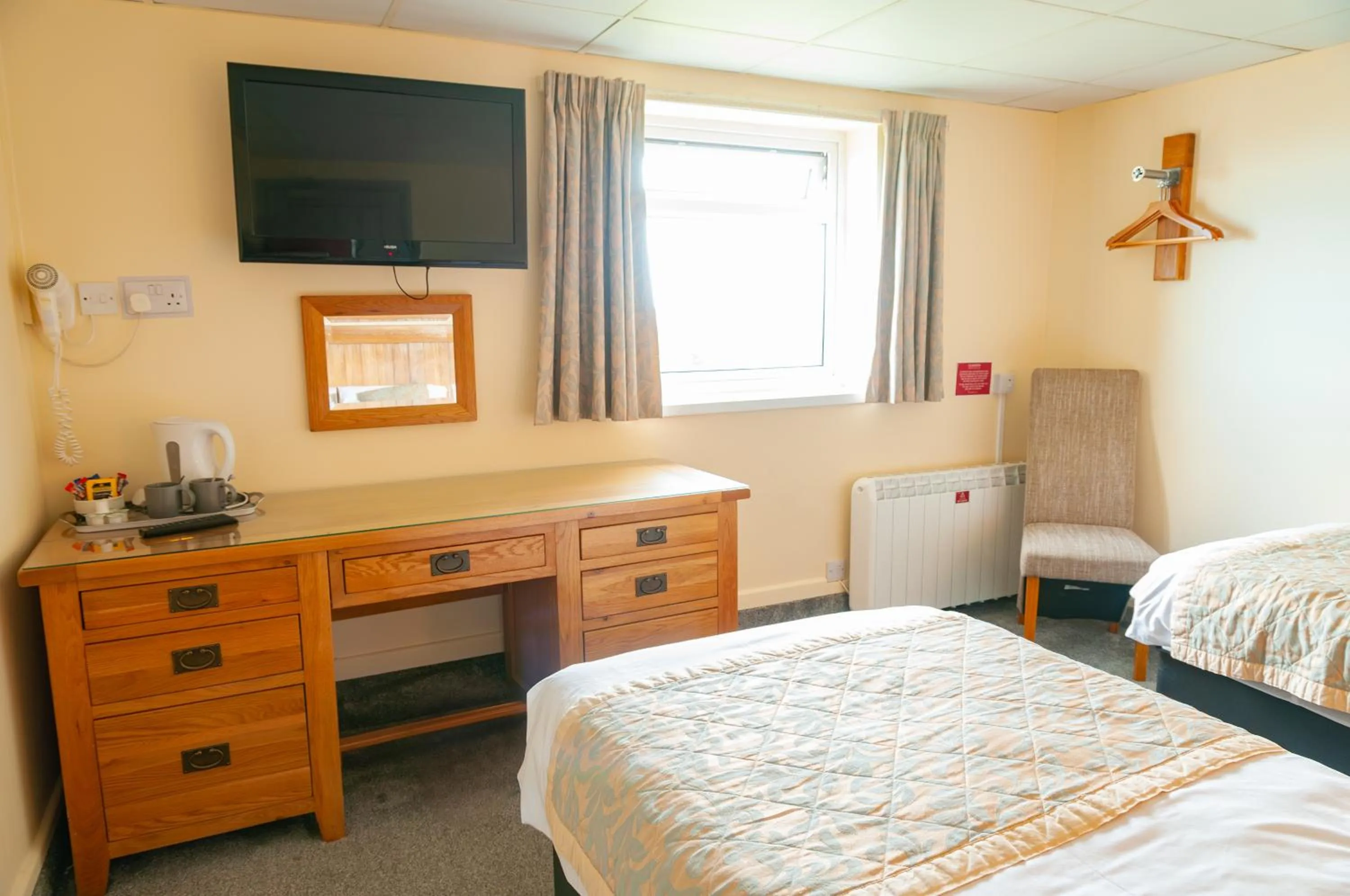 Bed in Claxton Hotel