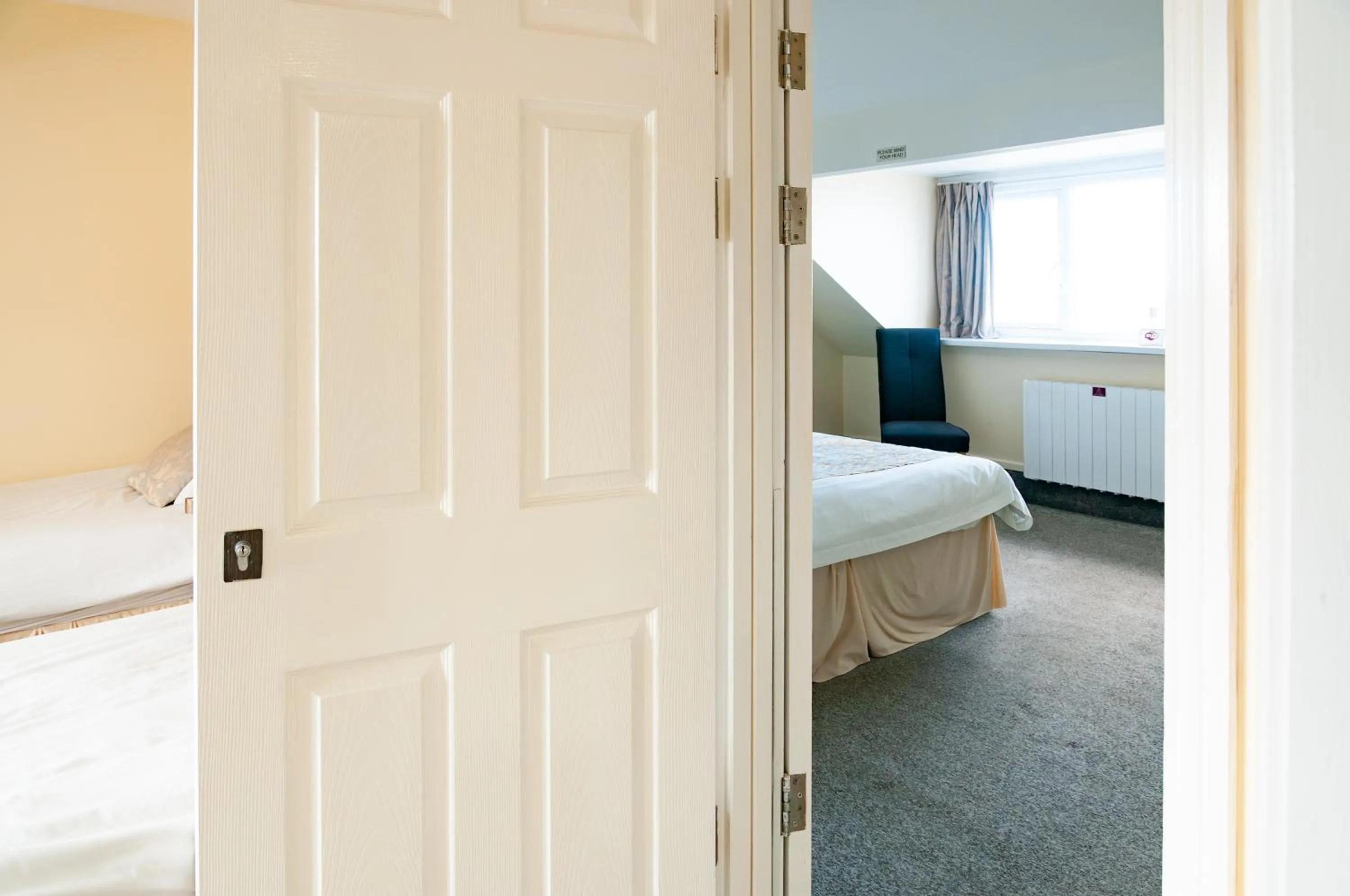 Bed in Claxton Hotel