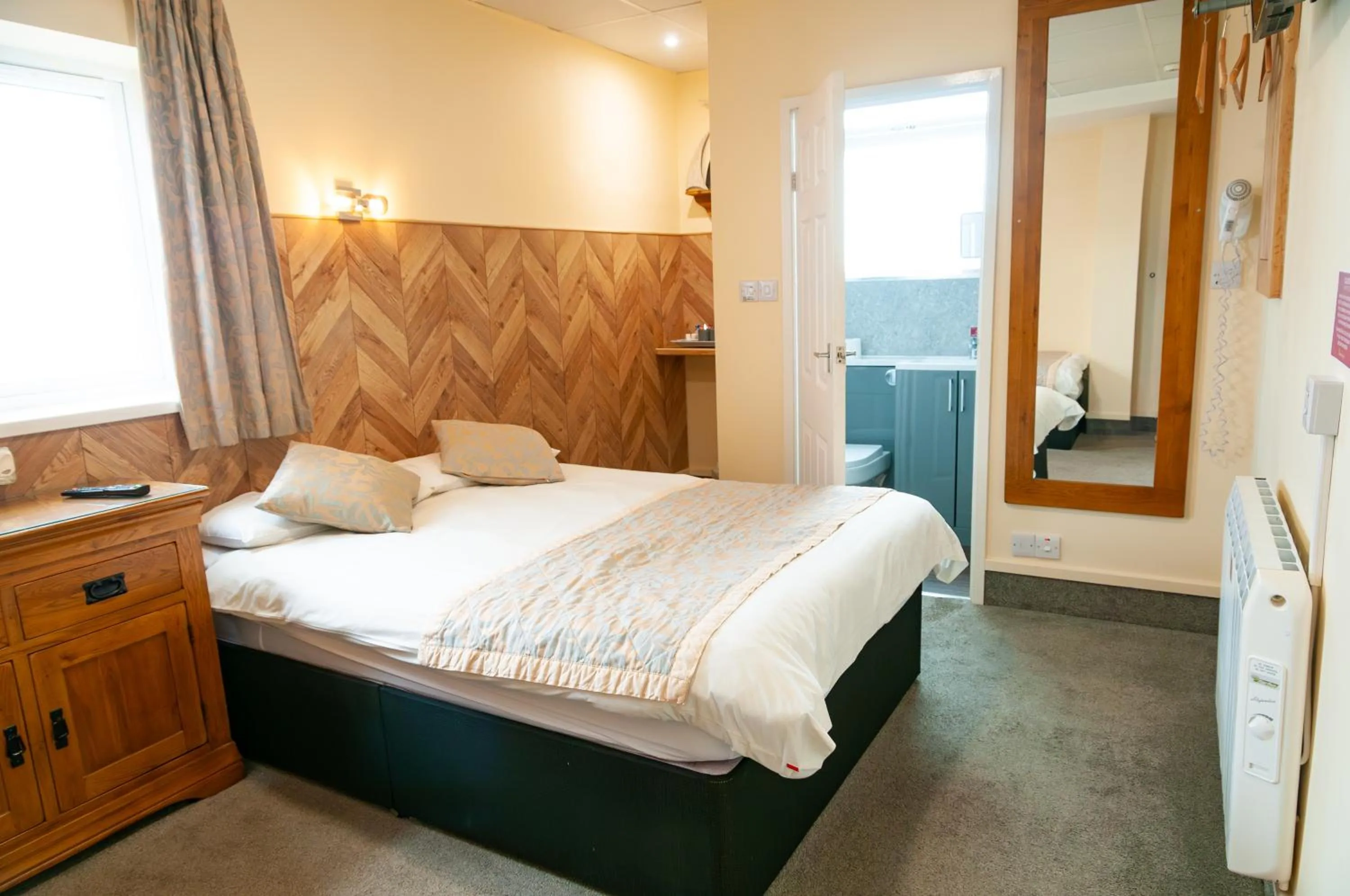 Bed in Claxton Hotel