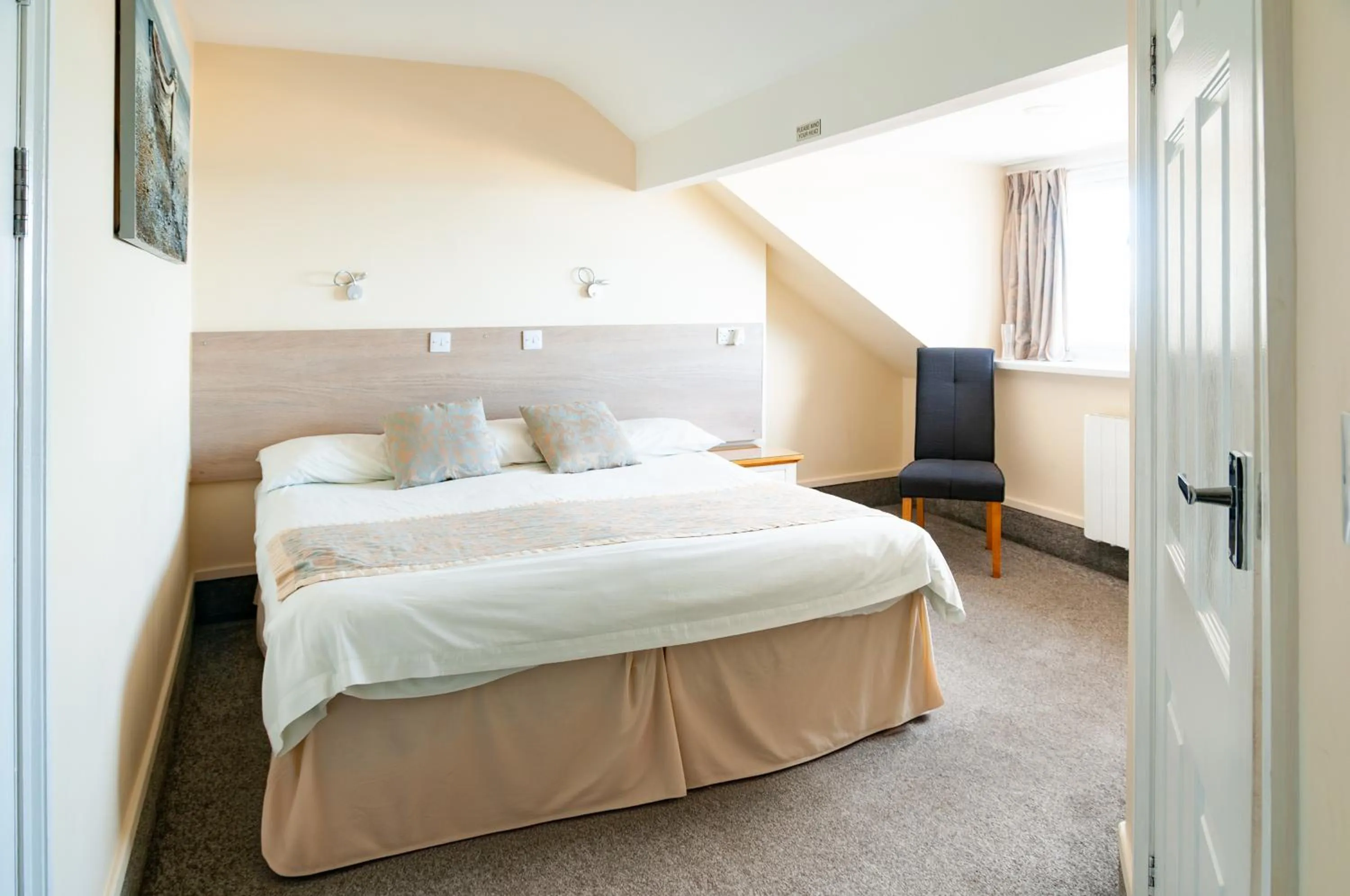 Bed in Claxton Hotel