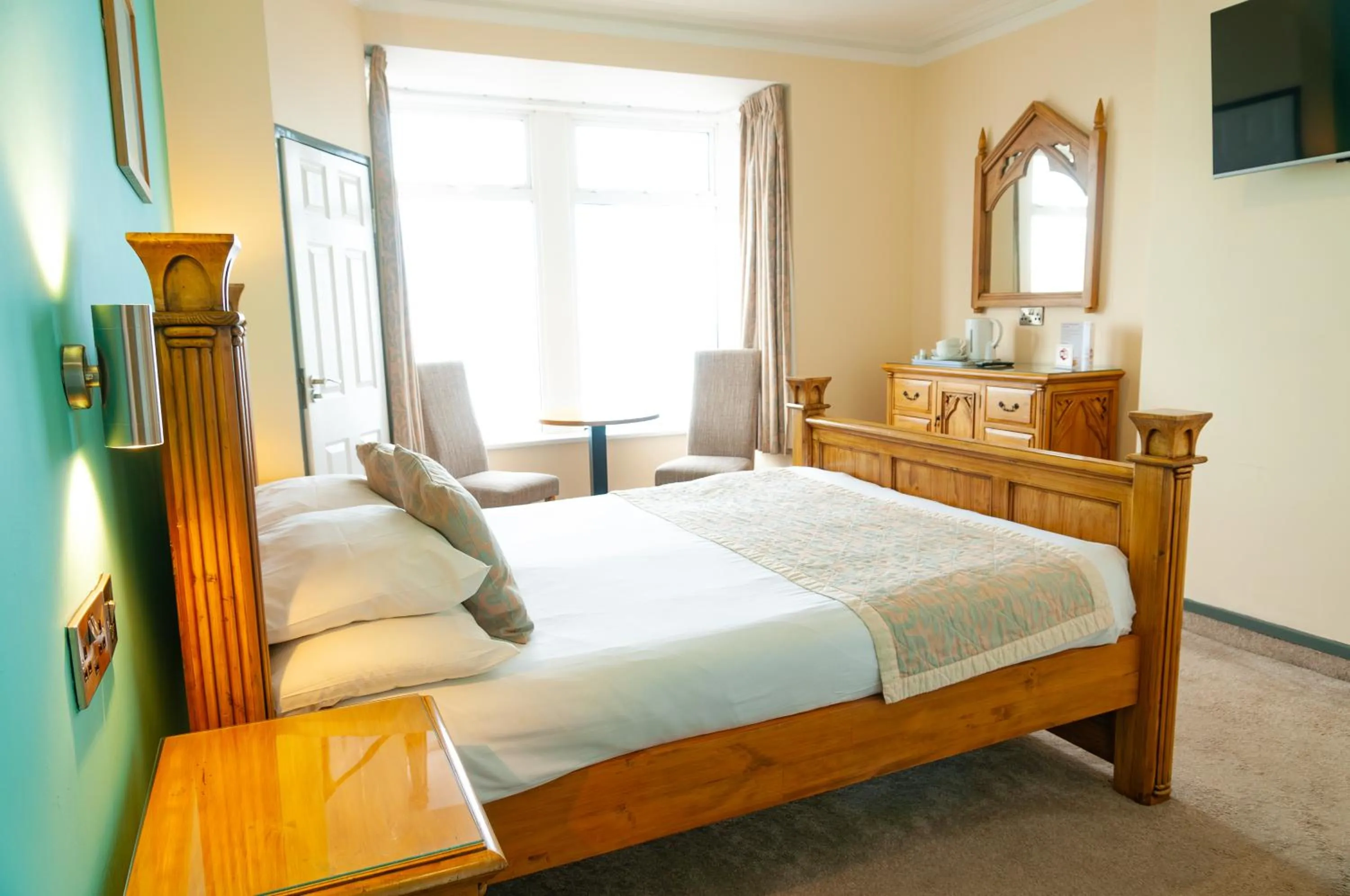 Bed in Claxton Hotel