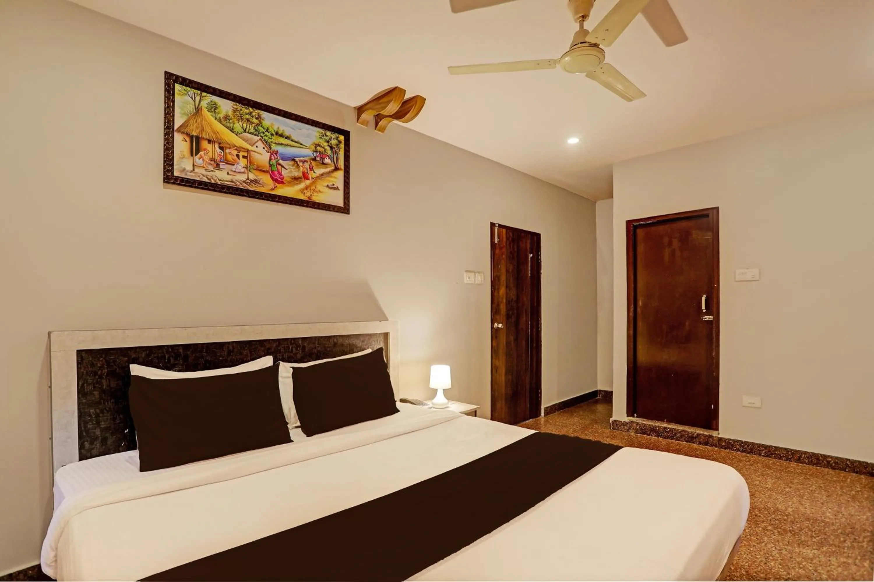 Bedroom, Bed in Super Capital O Vaishnavi