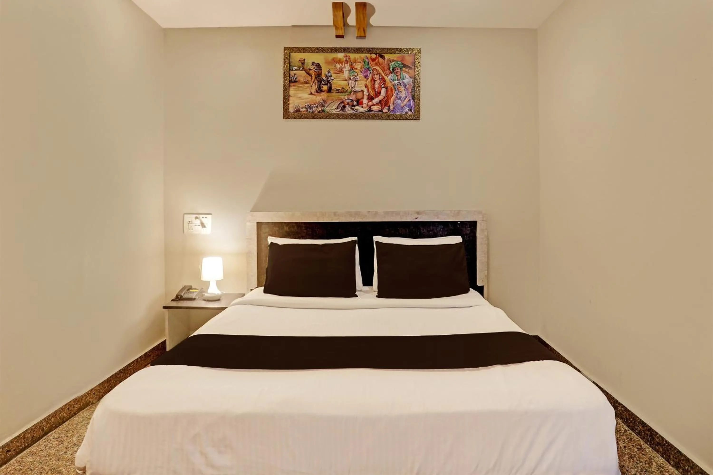 Bedroom, Bed in Super Capital O Vaishnavi