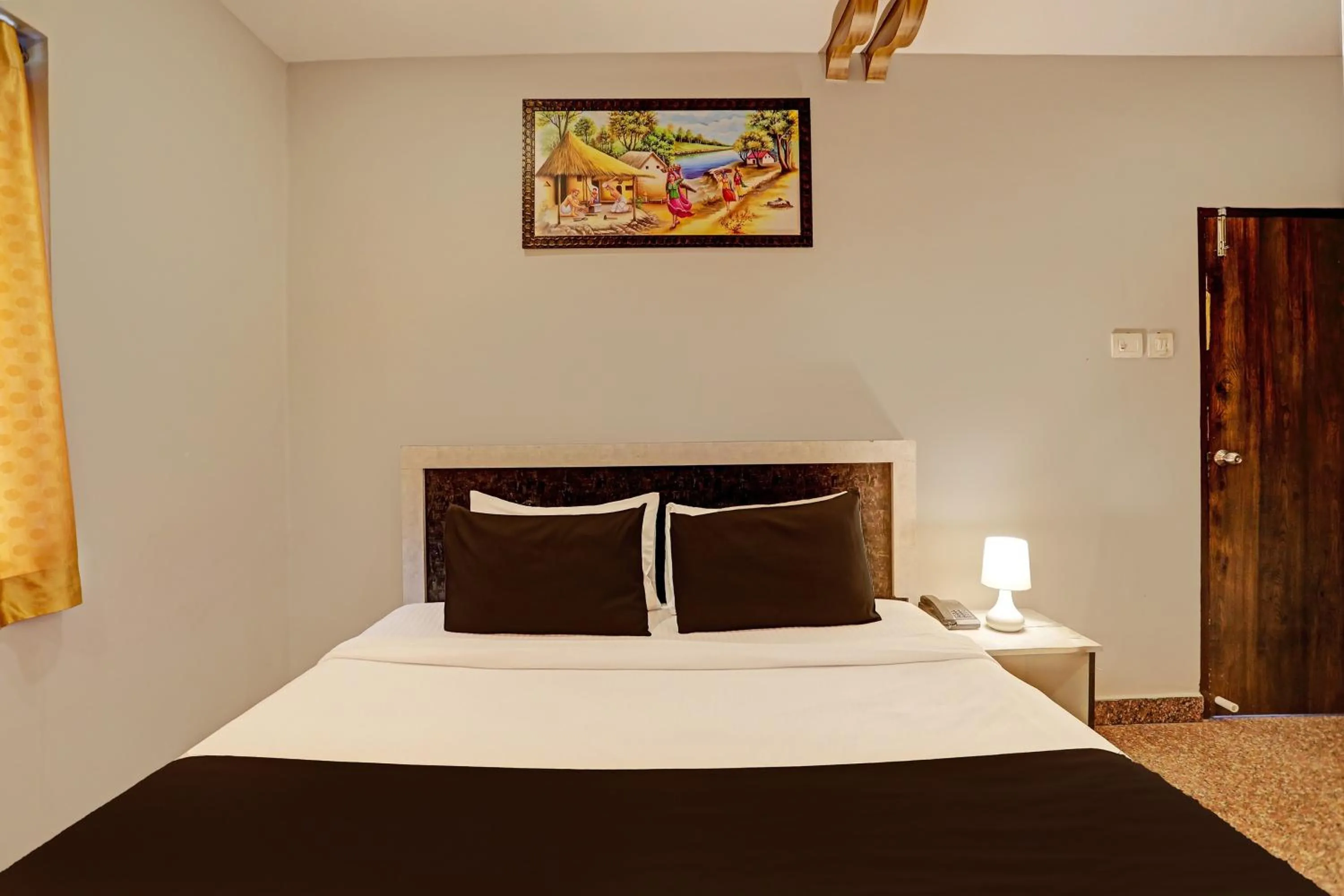 Bedroom, Bed in Super Capital O Vaishnavi