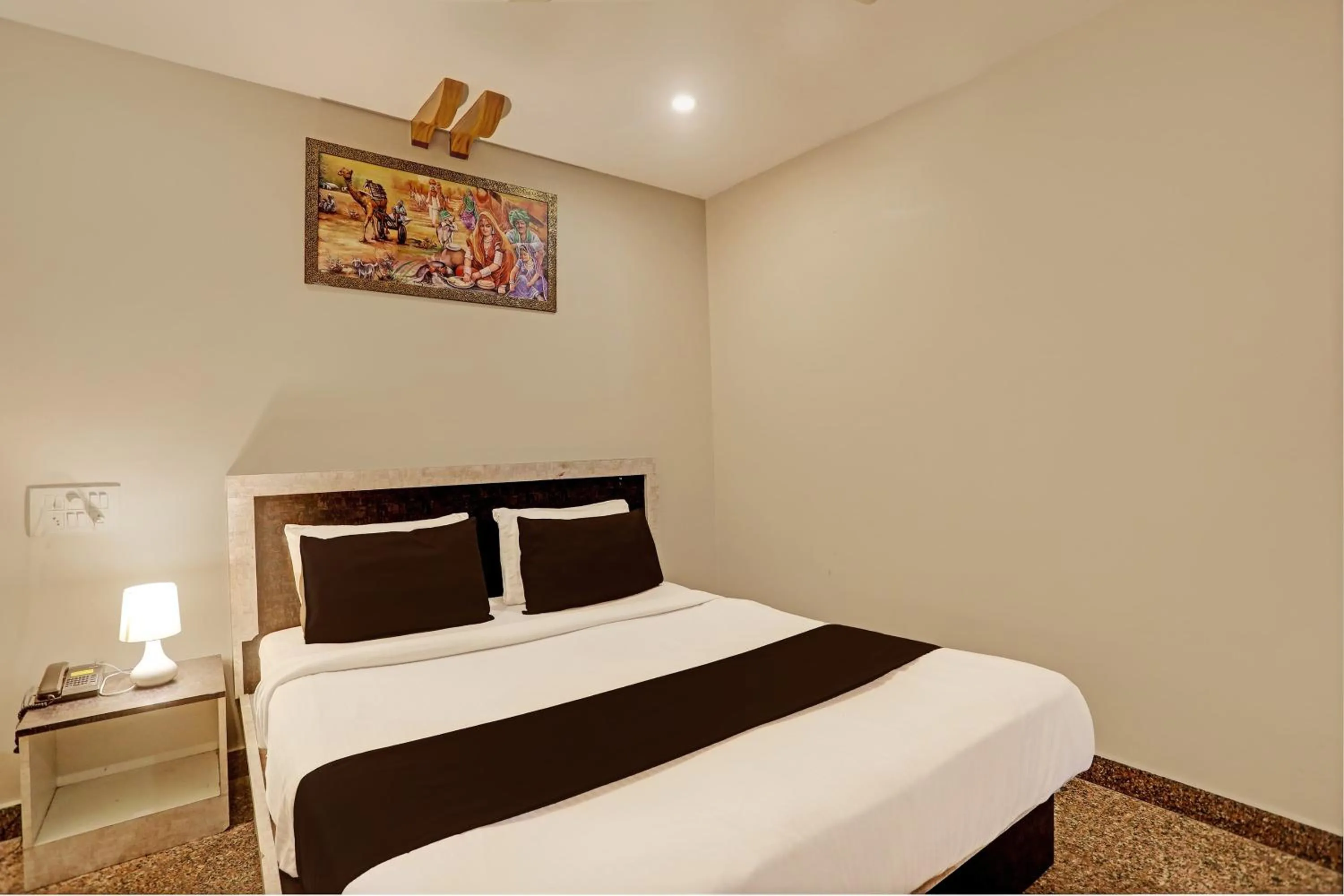 Bedroom, Bed in Super Capital O Vaishnavi