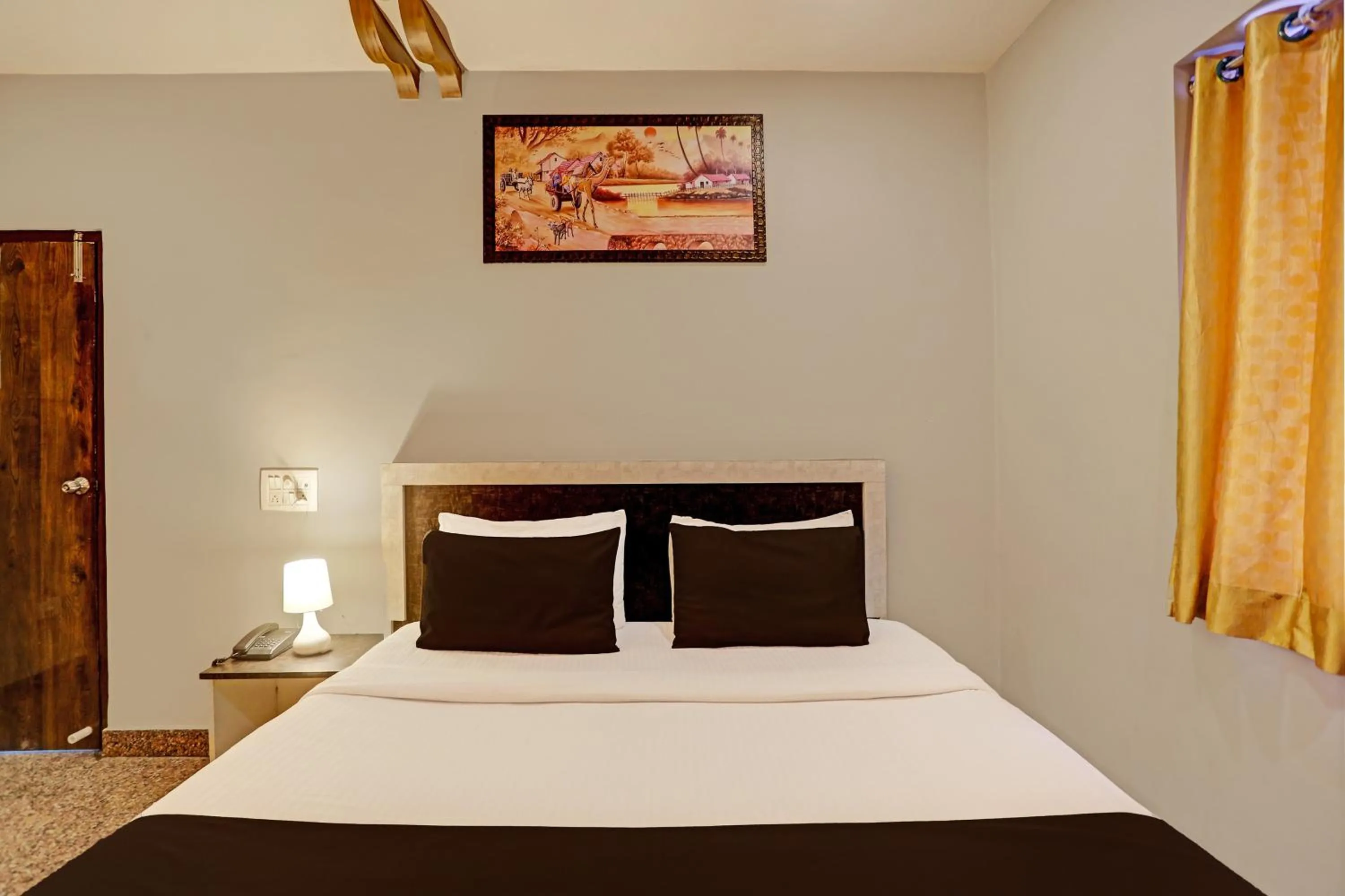 Bedroom, Bed in Super Capital O Vaishnavi