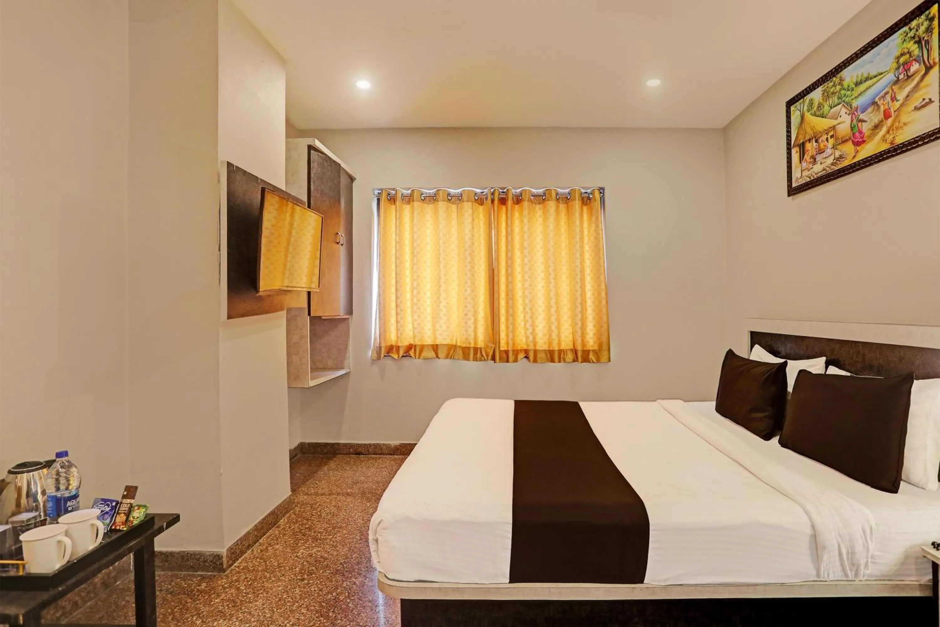 Bedroom, Bed in Super Capital O Vaishnavi