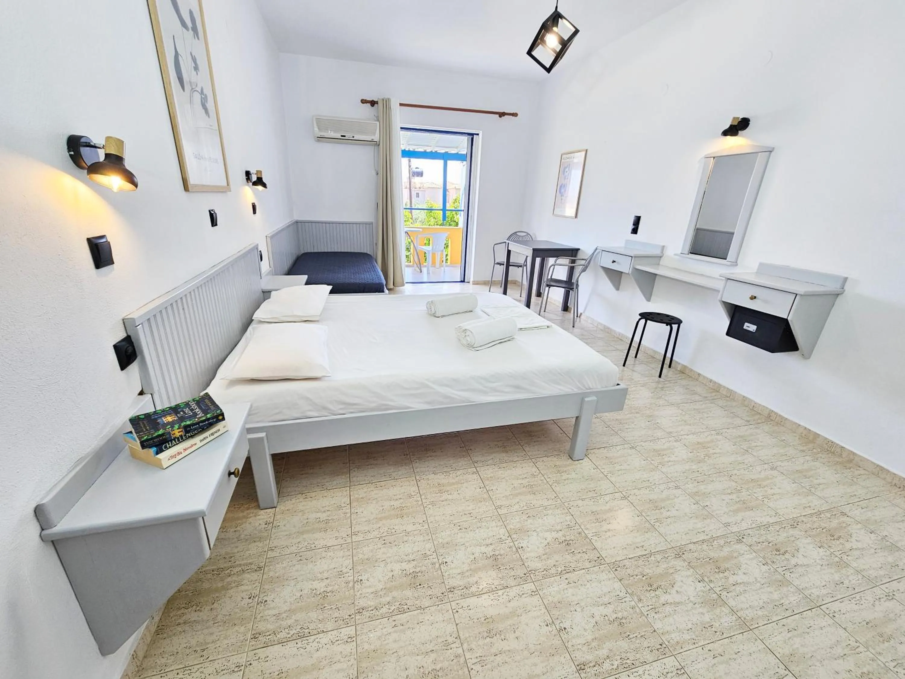 Bed in Pavlis Studios Kampos