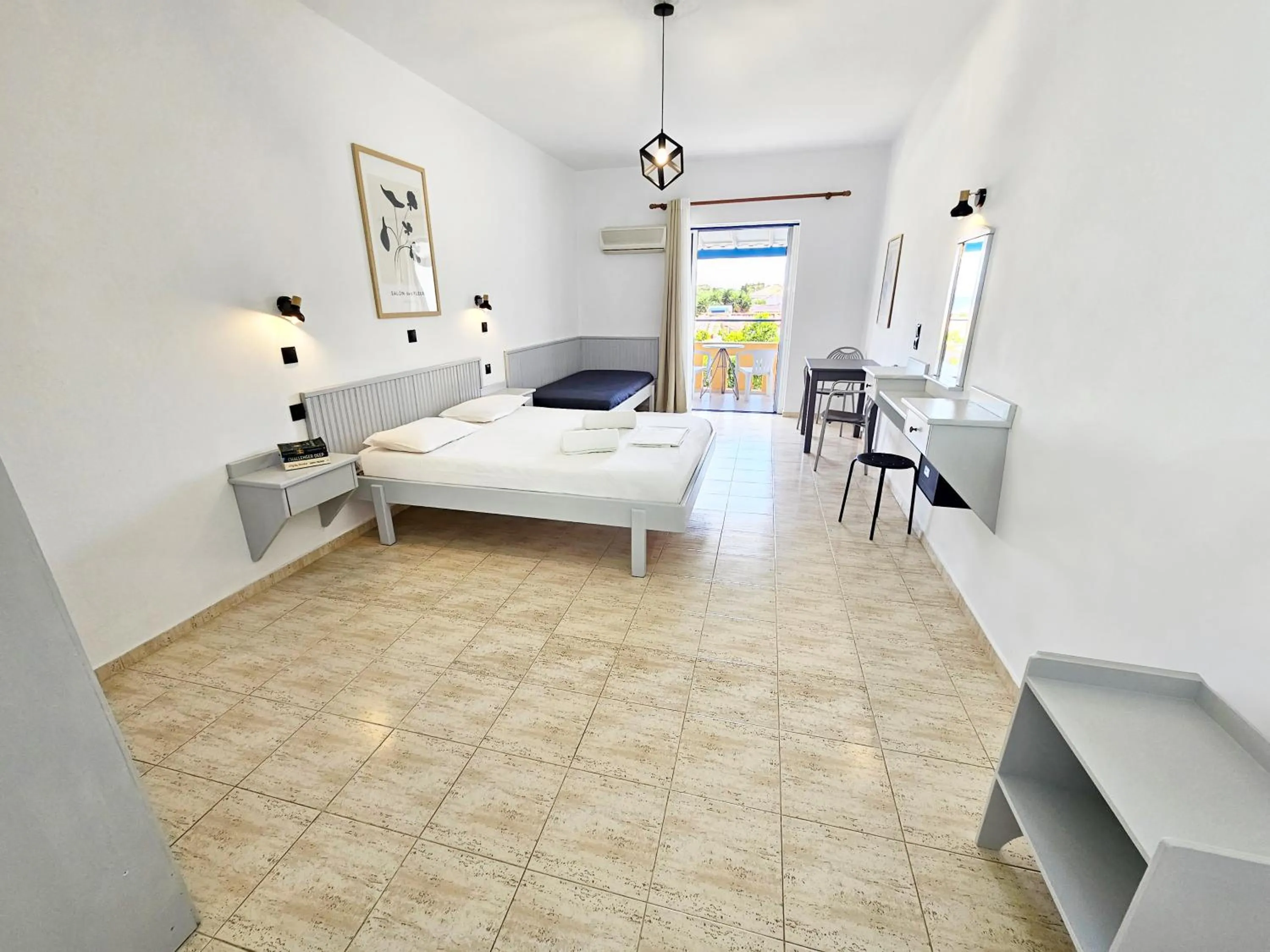 Bed in Pavlis Studios Kampos