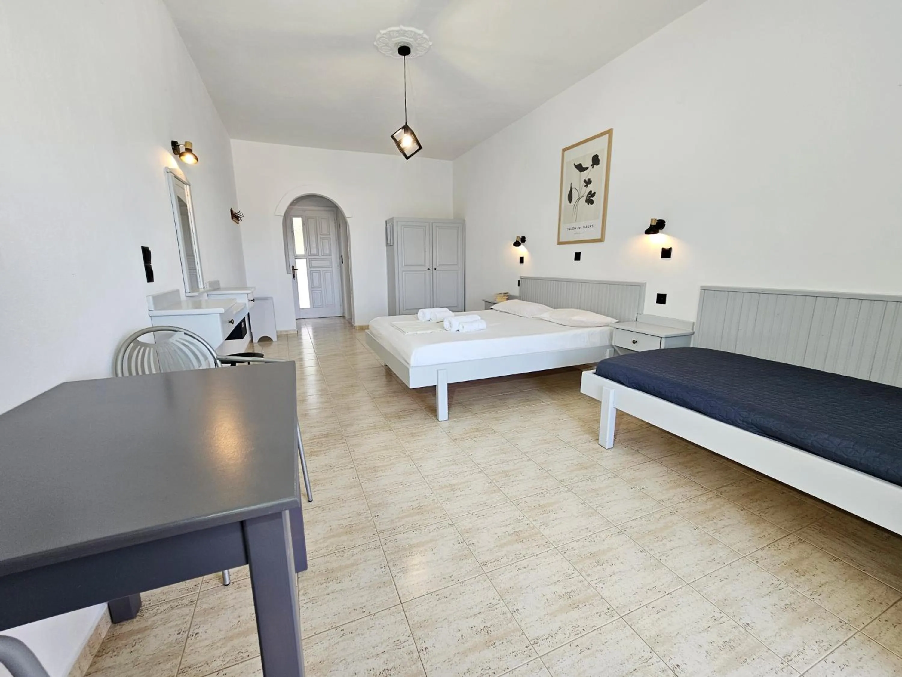 Bed in Pavlis Studios Kampos