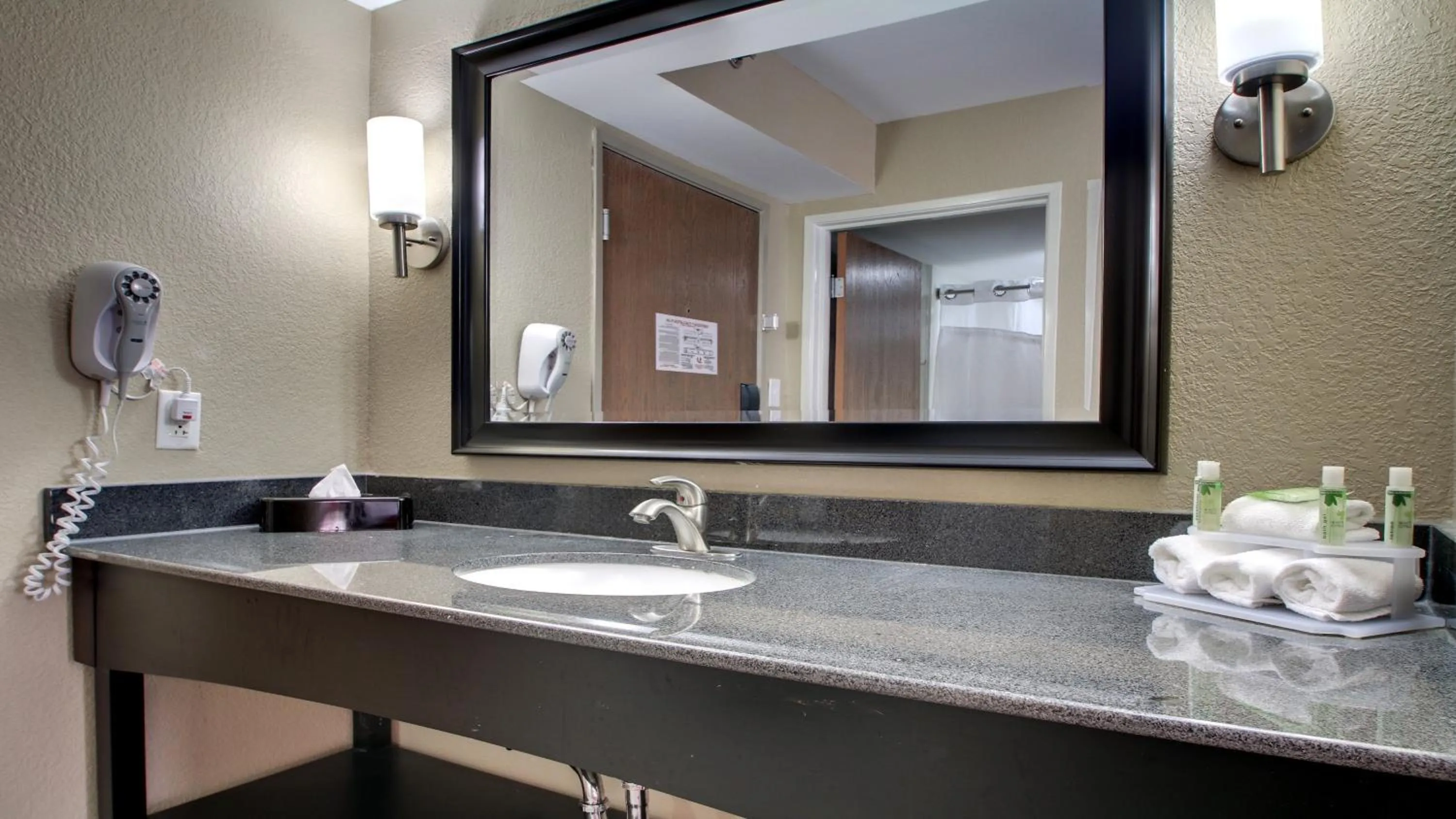 Bathroom in Holiday Inn Express & Suites Jackson Downtown - Coliseum by IHG