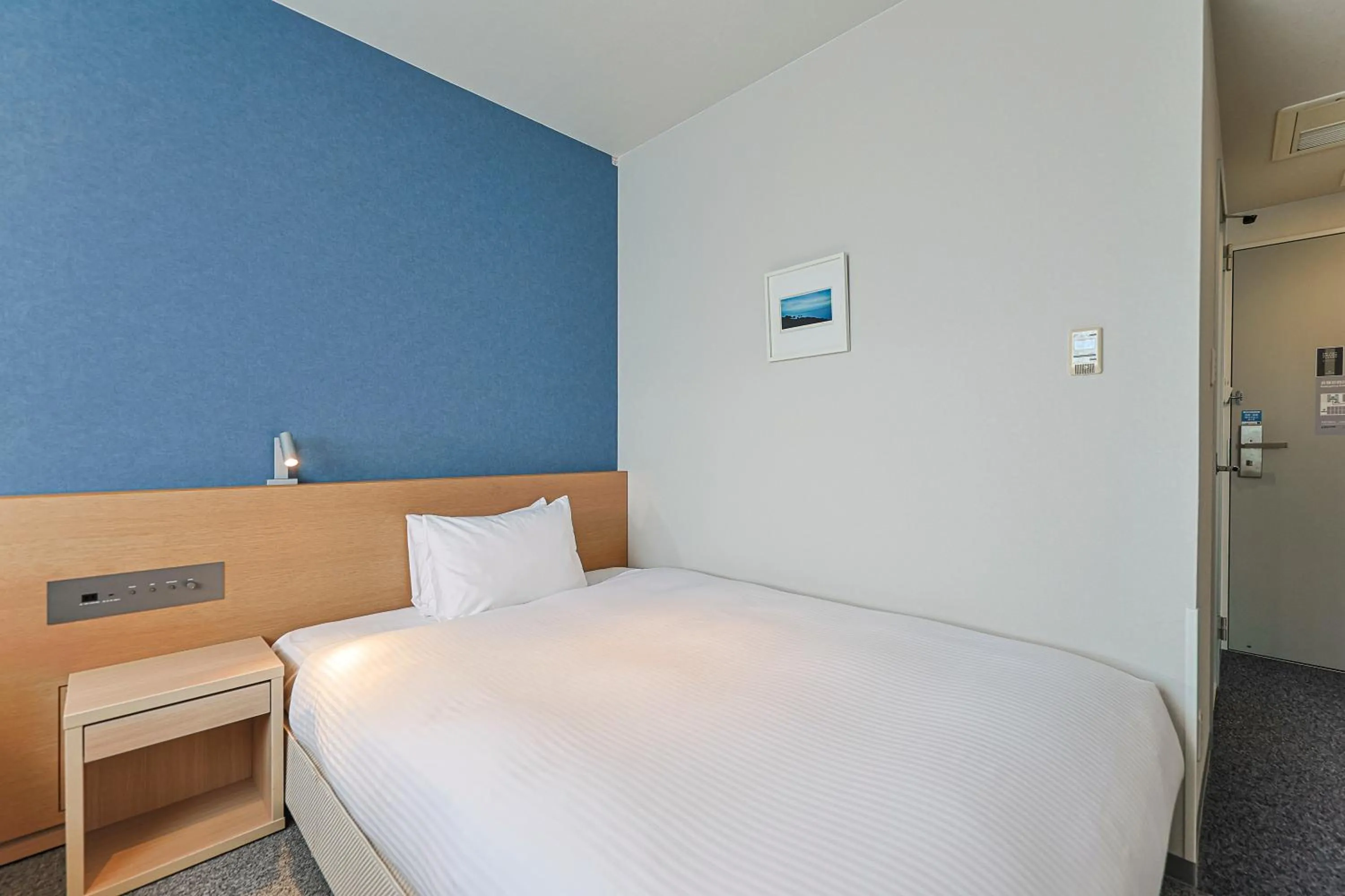 Photo of the whole room, Bed in JR Kyushu Hotel Miyazaki