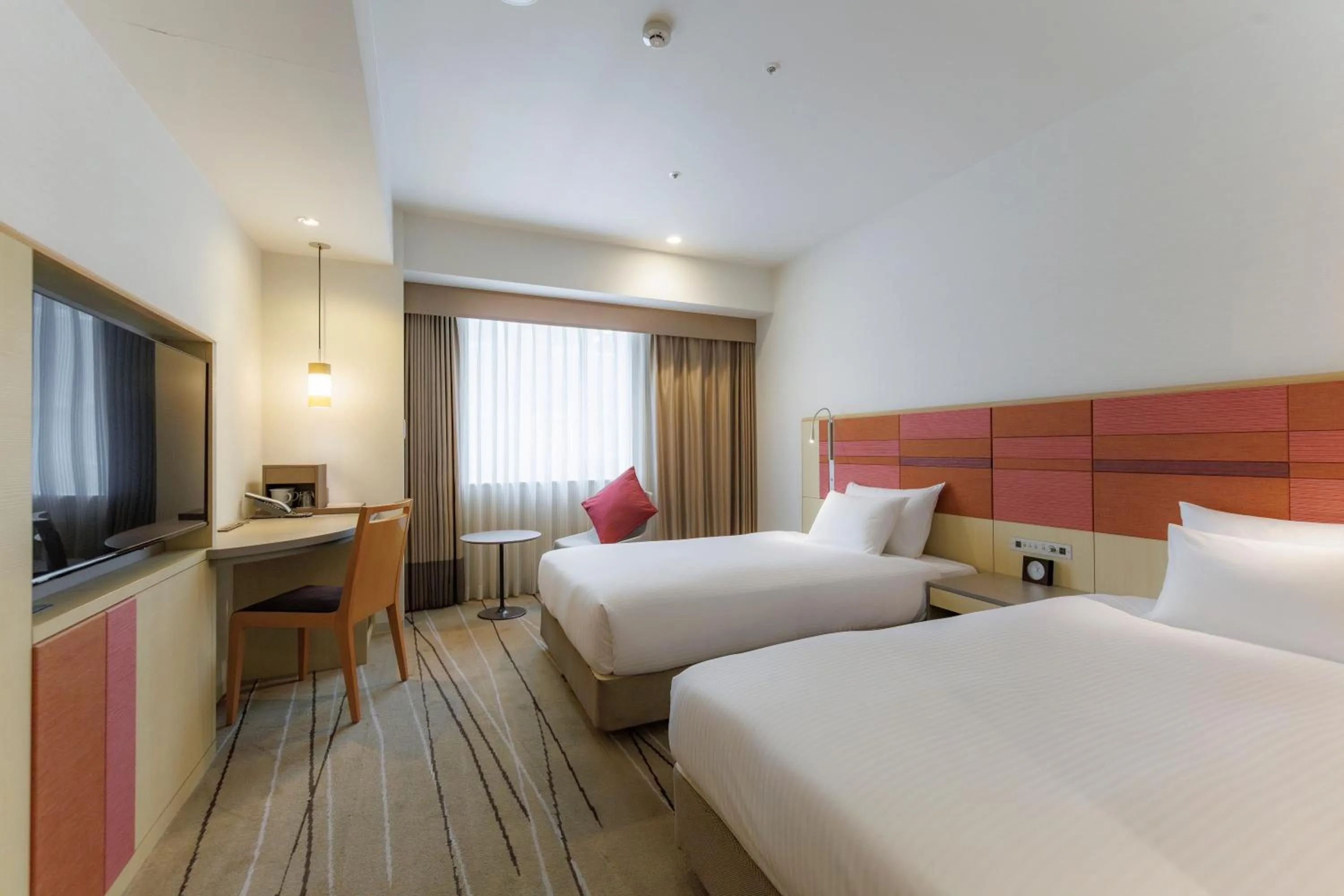 Bed in JR Kyushu Hotel Blossom Hakata Central