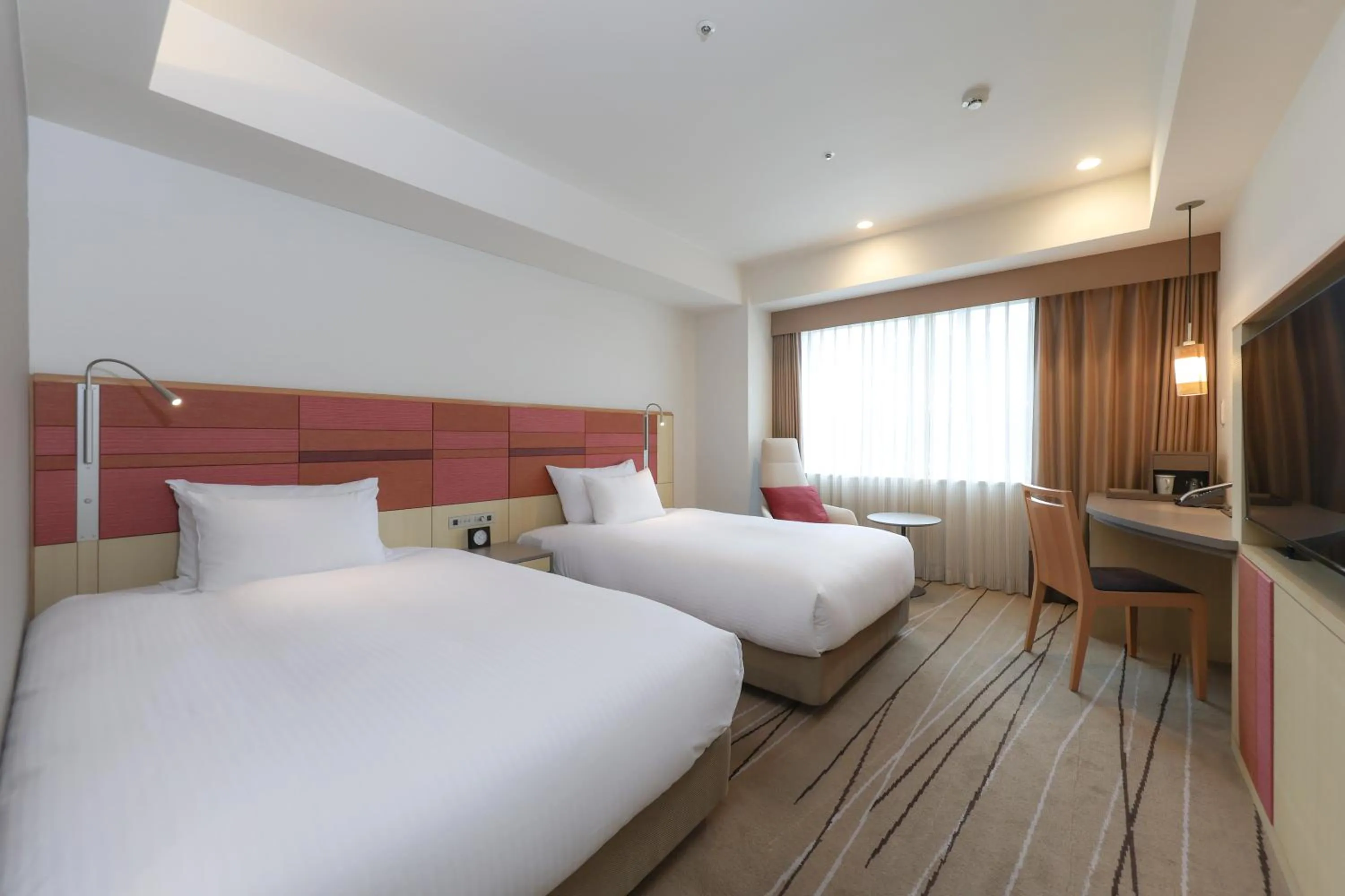 Bed in JR Kyushu Hotel Blossom Hakata Central