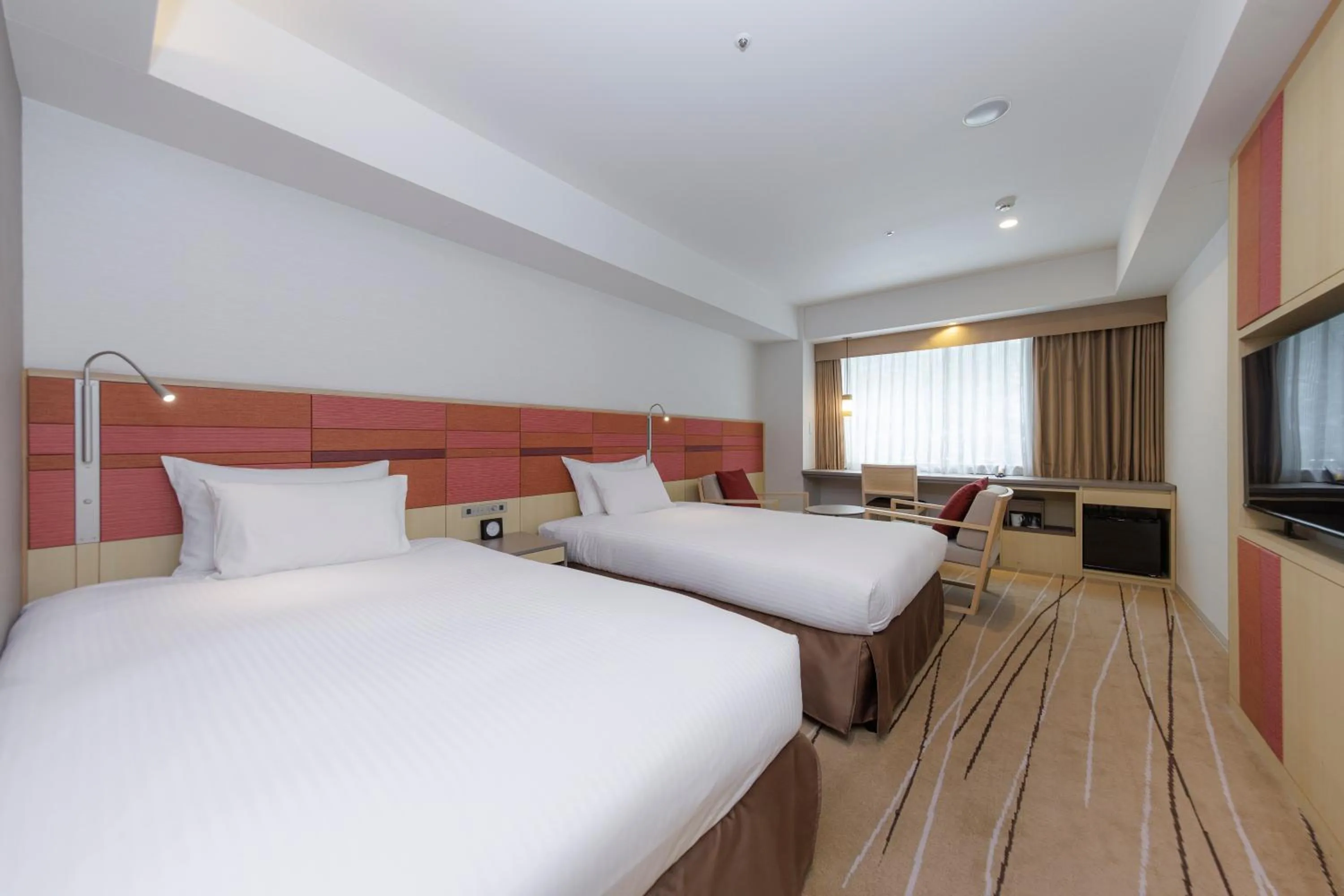 Bed in JR Kyushu Hotel Blossom Hakata Central