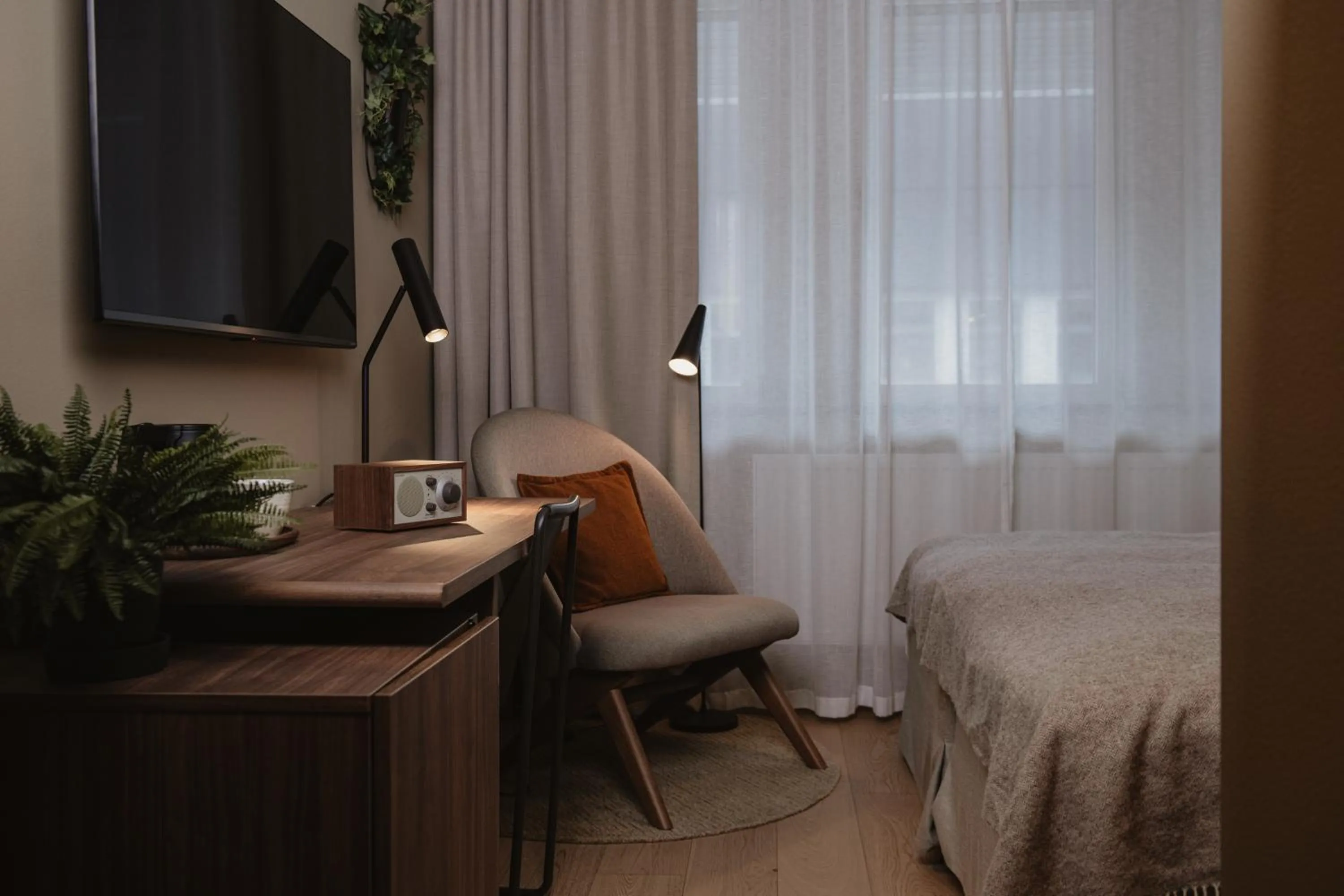 Bed in Home Hotel Mektagonen