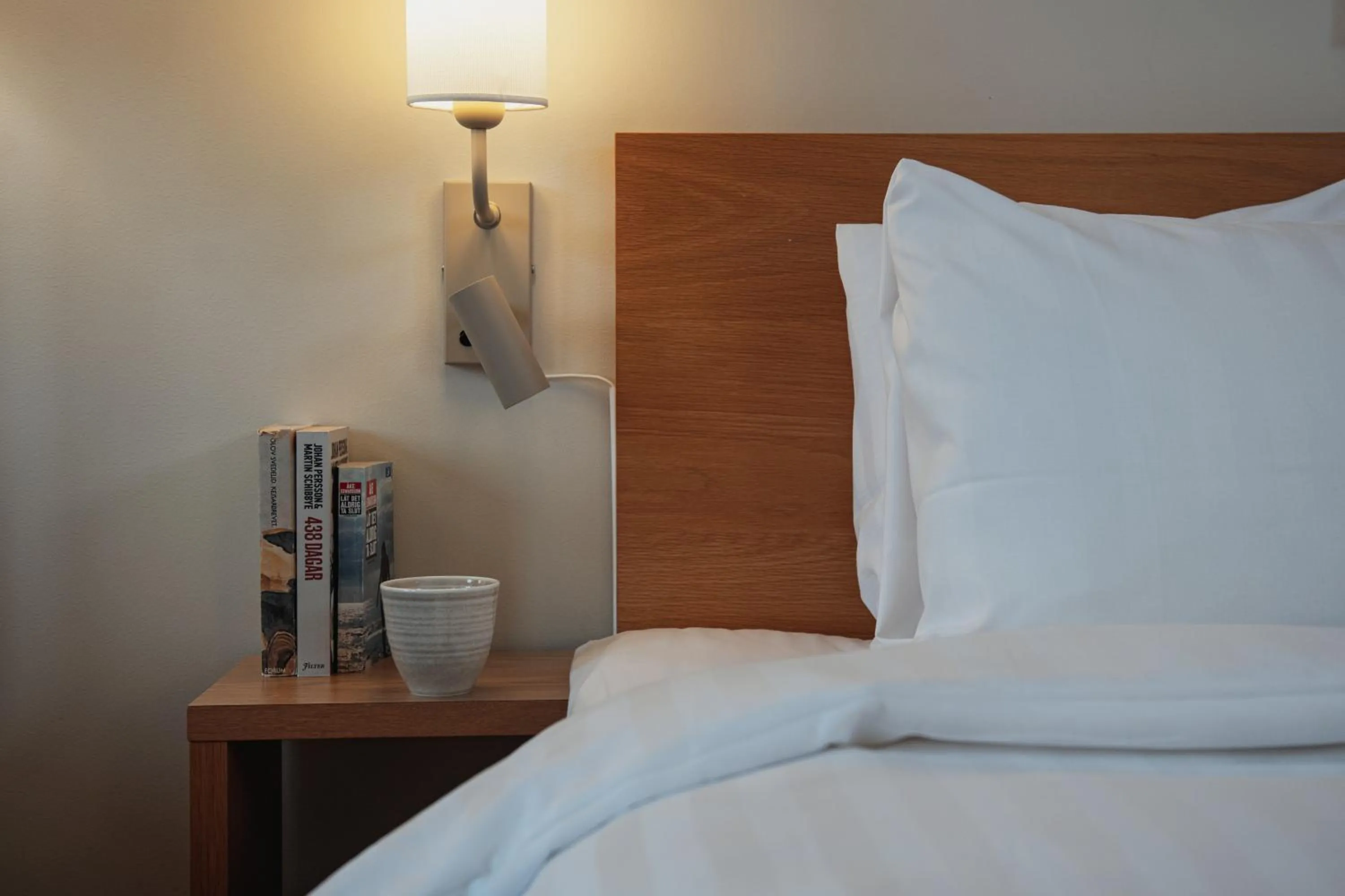 Bed in Home Hotel Mektagonen