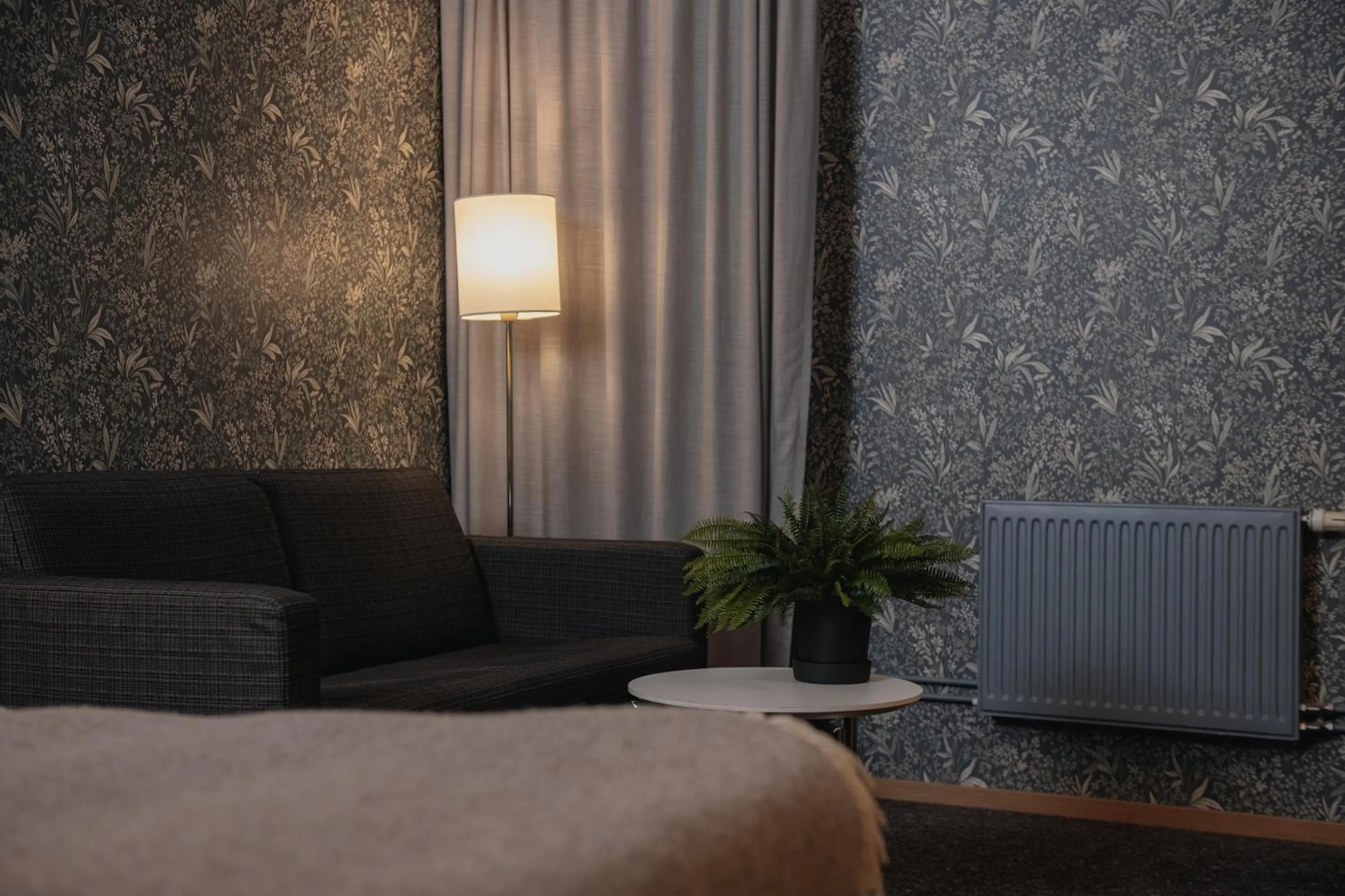 Bed in Home Hotel Mektagonen