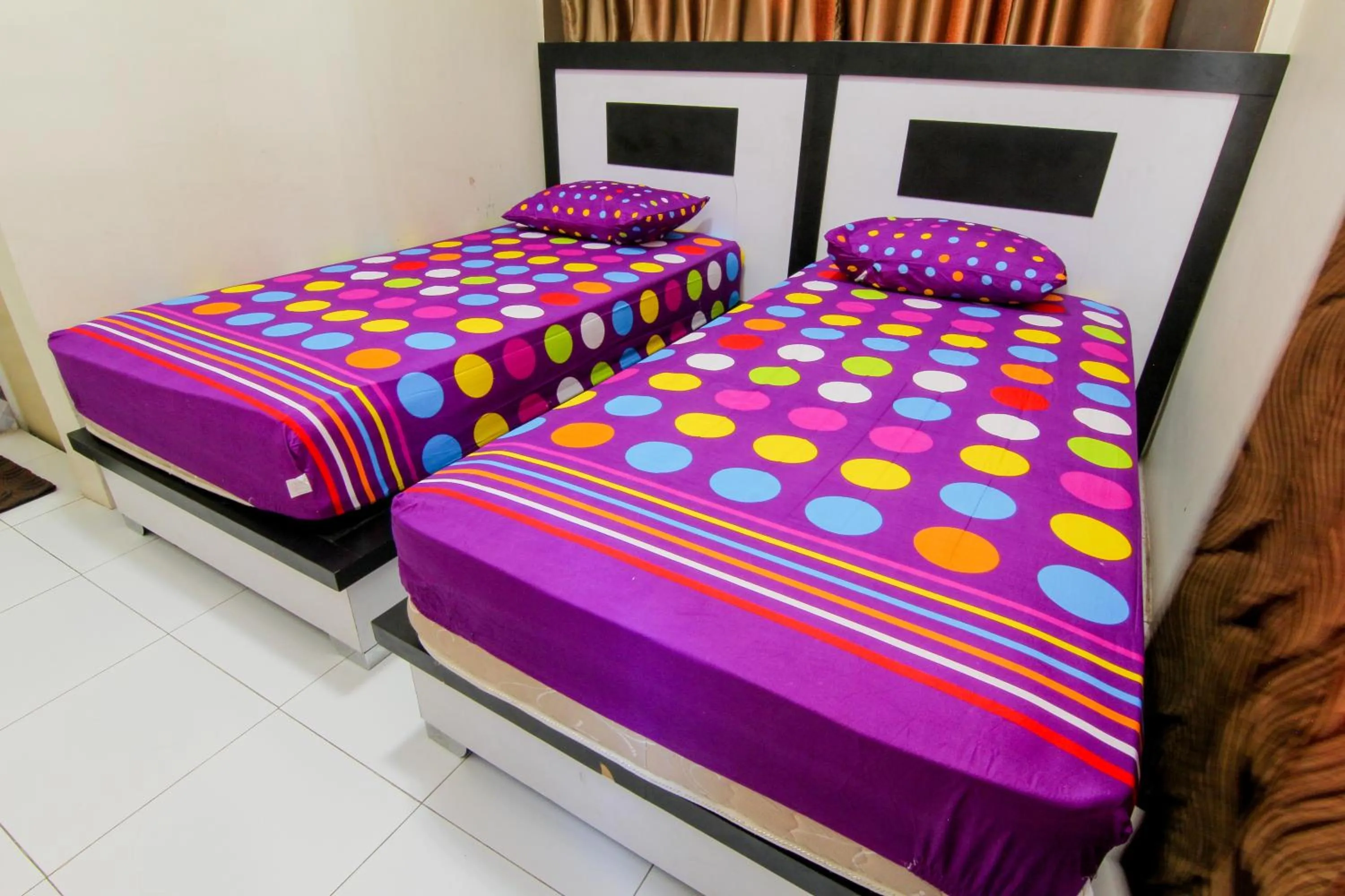 Bed in Trans Bandara Residence