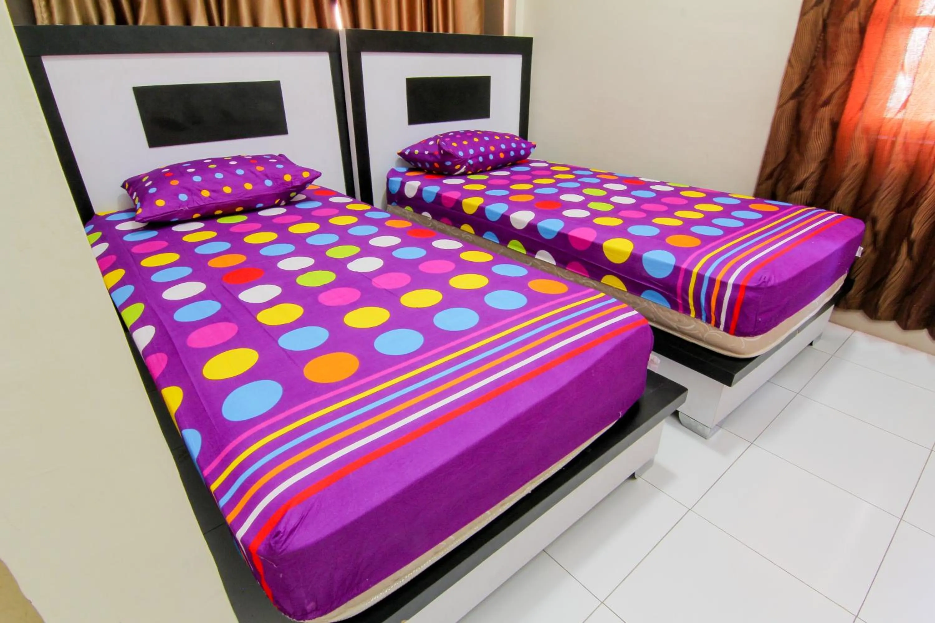 Bed in Trans Bandara Residence