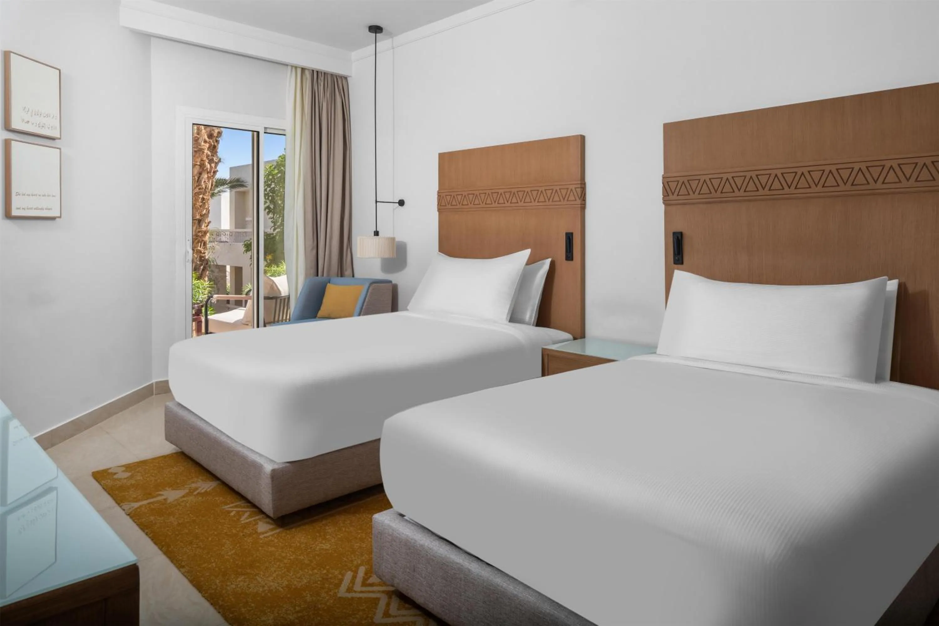 Bed in DoubleTree by Hilton Sharks Bay Resort